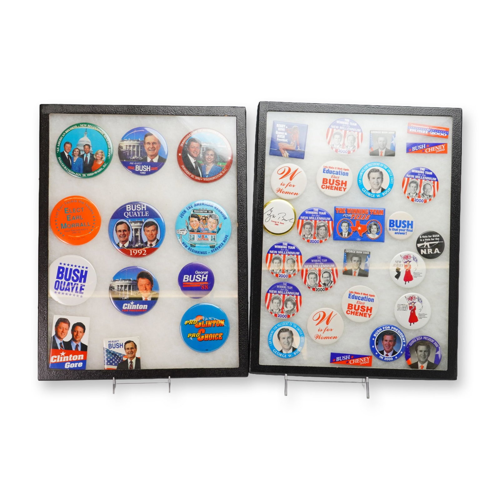 A Collection of American Presidential Campaign Buttons and Pins in 2 Tray Pin Display Cases: An assortment of American political campaign buttons and pins primarily from the late 20th and early 21st centuries, presented in a 2 tray pin display configuration. The collection features memorabili