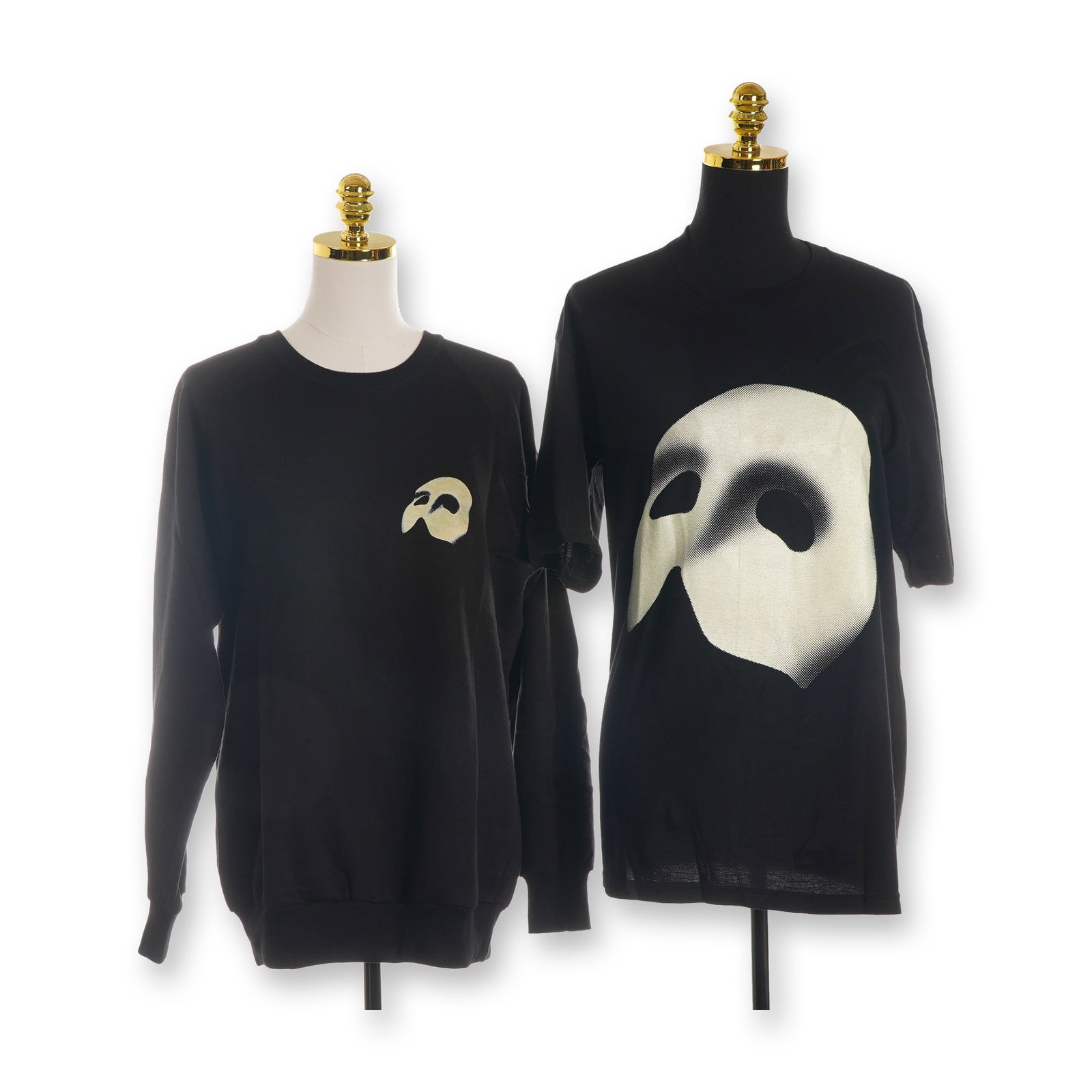 2pc Vintage Phantom of the Opera Glow-in-the-Dark Sweatshirt and T-Shirt: This lot comprises two pieces of official vintage theatrical merchandise for the musical The Phantom of the Opera, featuring glow-in-the-dark graphics. Both garments are size large and feature labels 