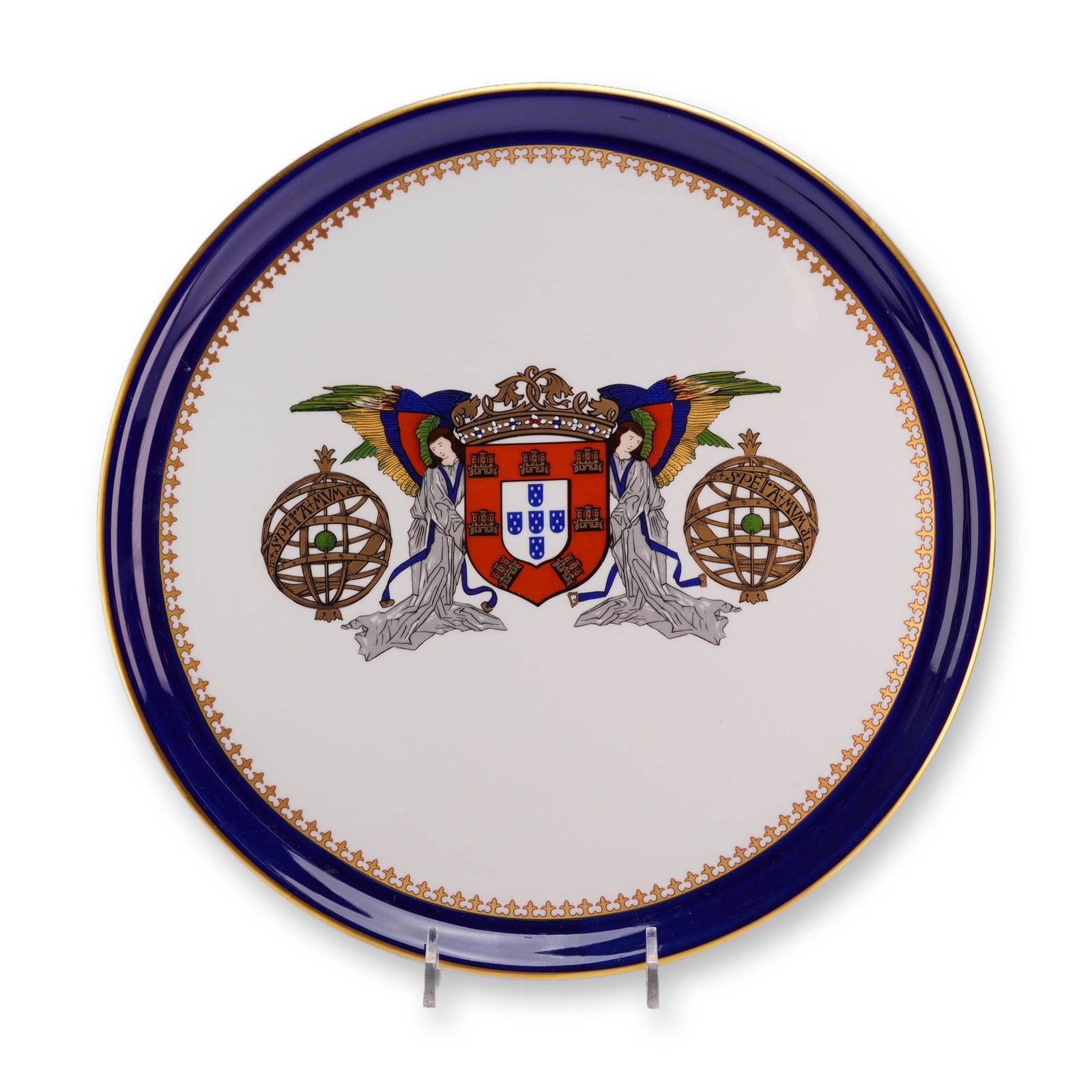 Portuguese Porart Porcelain Plate with Coat of Arms, D. Manuel I Pattern: This circular porcelain plate was manufactured by Porart in Portugal as part of the Companhia das Indias series. The central decoration features a polychrome coat of arms of Portugal supported by two 