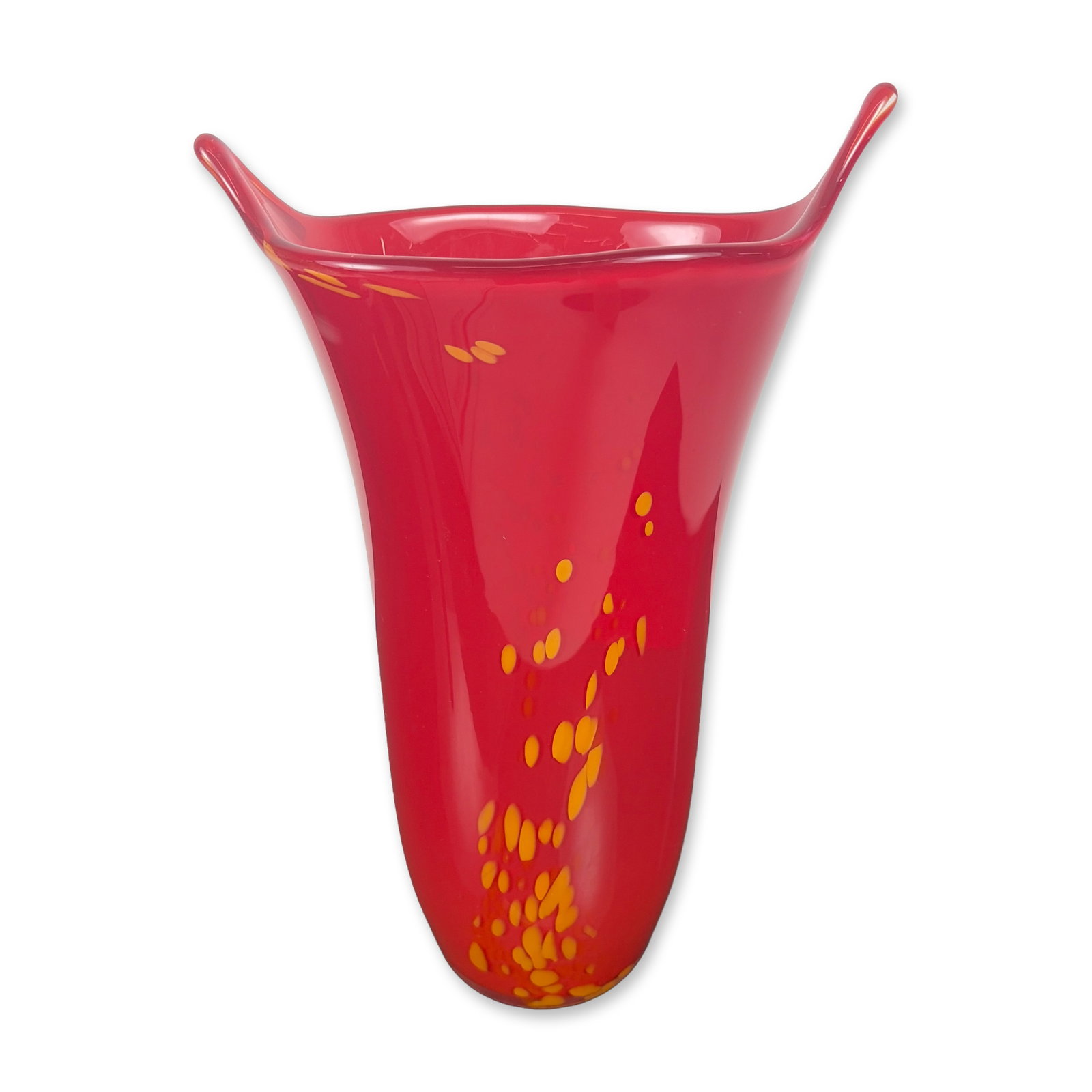 Studio Art Glass Trumpet Vase: Art glass vase in a flared trumpet form, crafted in ruby red glass with a stylized rim featuring two opposing pulled points. The vessel is decorated with yellow and orange pulled-spot inclusions