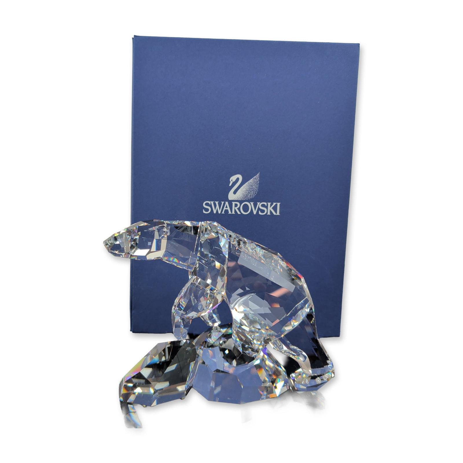 Swarovski Crystal Polar Bear Nanuc Figurine: This Swarovski crystal Nanuc Polar Bear, part of the dazzling Crystal Classics collection, was introduced alongside the Illuliac iceberg. Designed by Heinz Tabertshofer, it features an elegantly etche