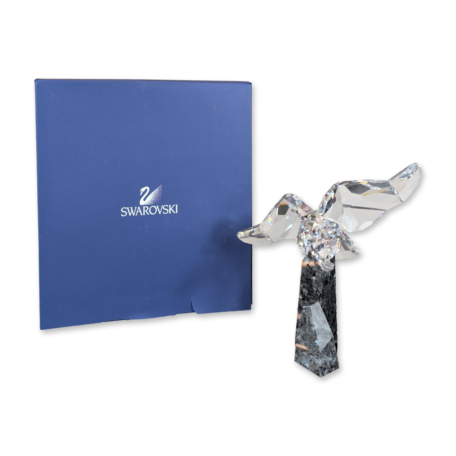 Swarovski Soulmates Wings of Liberty Crystal Eagle Soulmates: Swarovski Austrian crystal figurine from the Soulmates collection, titled Wings of Liberty. The piece features a faceted clear lead crystal eagle depicted in flight with spread wings and a forked tail