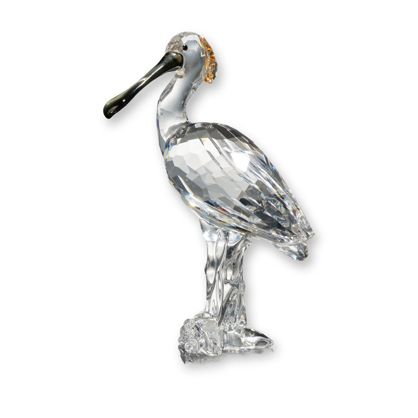 Swarovski Silver Crystal Spoonbill Bird Figurine: Swarovski crystal figurine of a spoonbill bird, part of the Feathered Beauties collection, model number 931746. The figure is crafted from multifaceted clear lead crystal with a contrasting smoky oliv