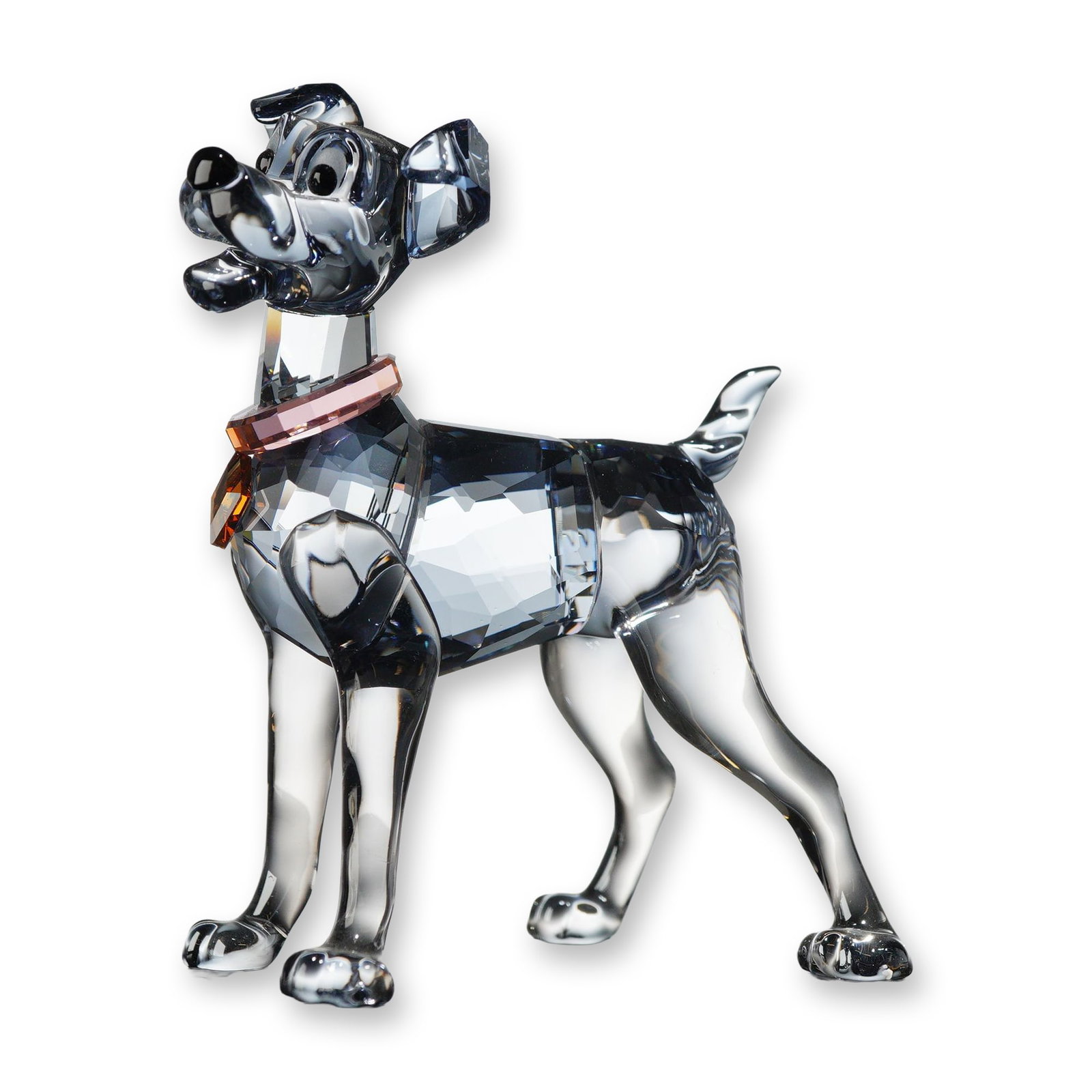 Swarovski Crystal Disney Tramp Figurine: Swarovski crystal figurine depicting the character Tramp from Disney's Lady and the Tramp, model number 1090823. Crafted in faceted clear crystal with subtle gray and blue shading on the ears, back, a