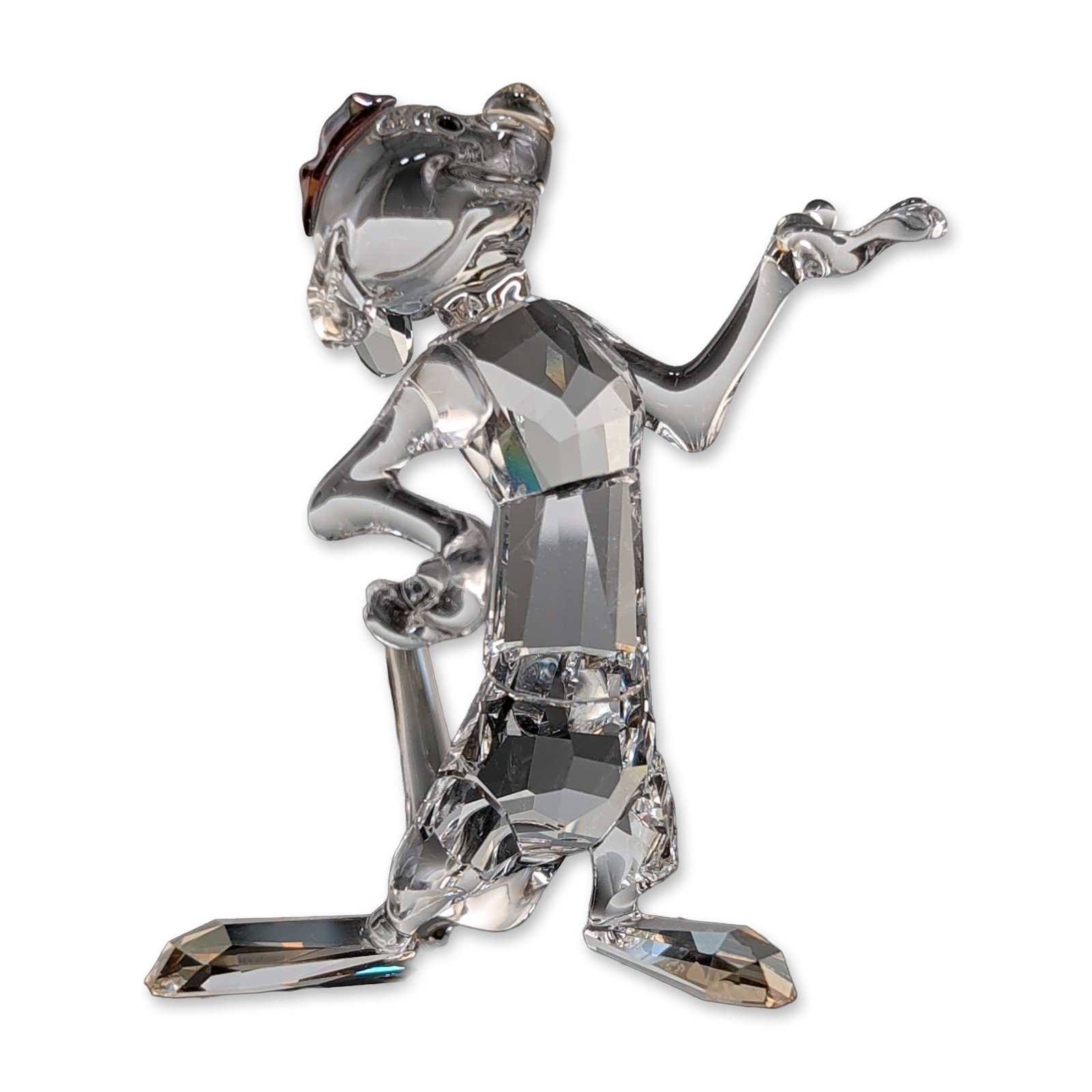 Swarovski Disney Lion King Timon Crystal Figurine: Swarovski crystal figurine depicting the character Timon from Disney's The Lion King. The meerkat is presented in a dynamic pose, constructed from faceted clear lead crystal with colored accents. The 
