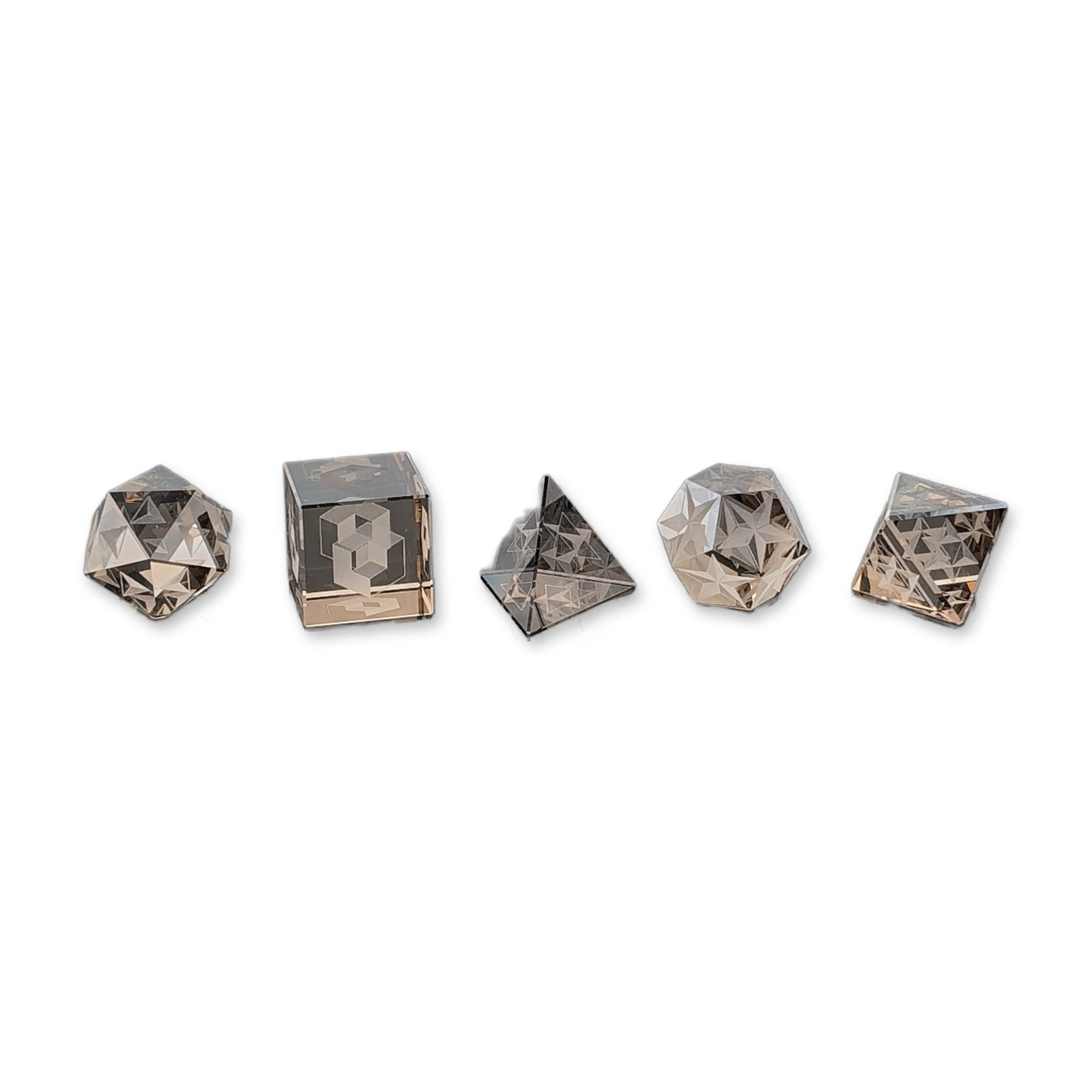 Swarovski Kristallwelten Limited Edition Crystal Platonic Bodies Set: Swarovski Kristallwelten production featuring a set of five geometric solids in faceted clear lead crystal. Each piece features internal laser-etched geometric patterns echoing the outer faceted form.