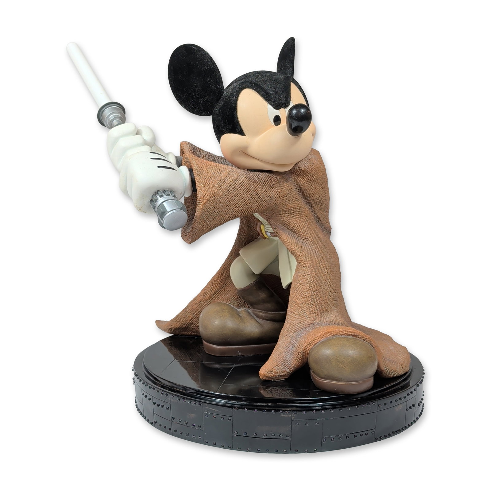 The Art of Disney Brian Blackmore Star Wars Figurine, Jedi Mickey: Brian Blackmore for The Art of Disney. A collectible figure, known as a Big Figure, depicting Mickey Mouse as a Jedi Knight. The figure is modeled in a dynamic action pose wearing a textured brown rob