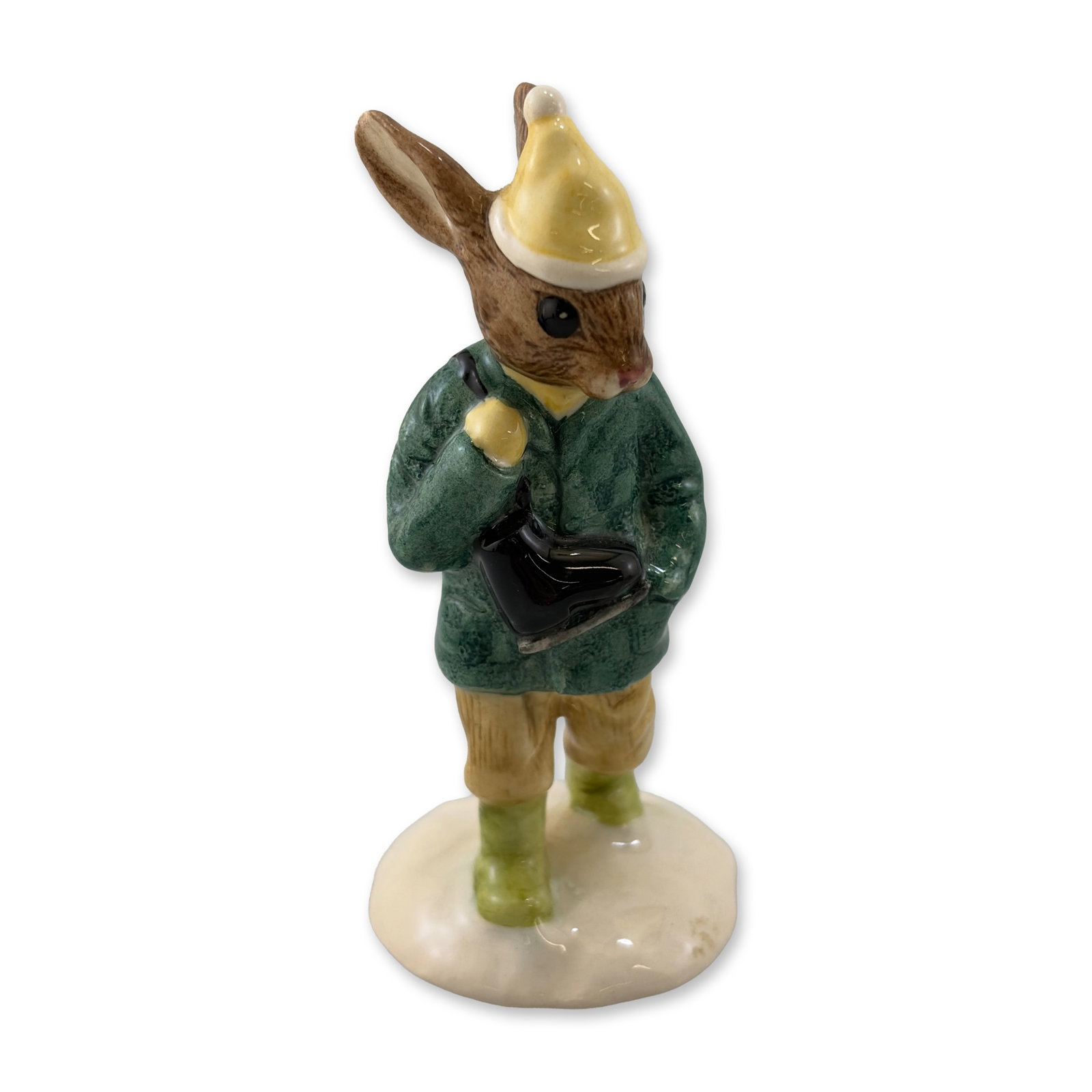 Royal Doulton Boy Skater Bunnykins DB 152 Figurine: Royal Doulton porcelain figurine titled Boy Skater, model number DB 152, from the Bunnykins series. The glazed character figure is depicted in winter clothing, featuring a dark green coat, tan knicker