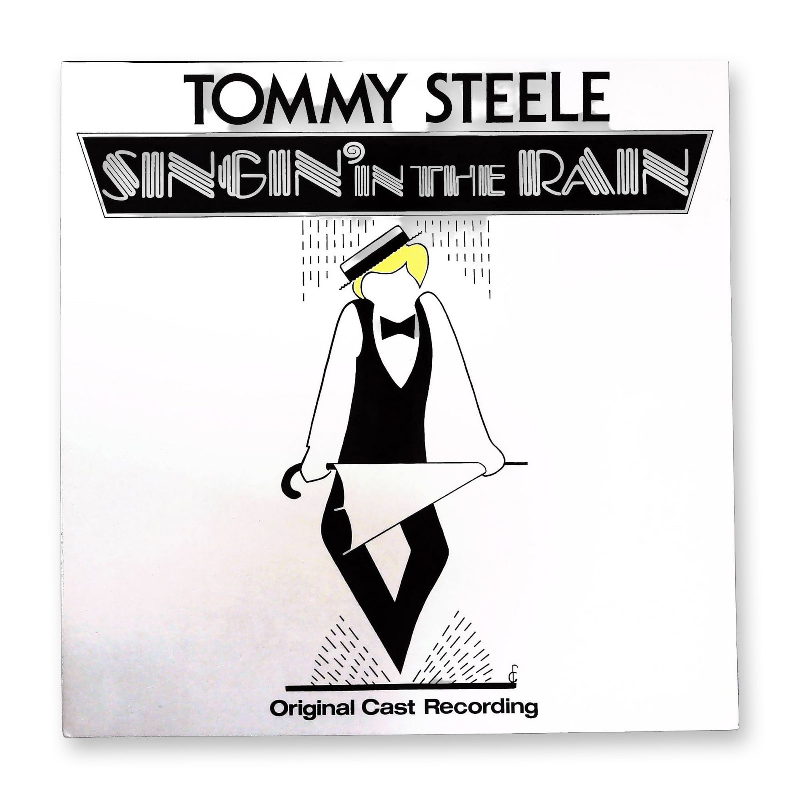 Tommy Steele Singin' In The Rain Original Cast Recording LP 1984: A single vinyl LP record featuring the Original Cast Recording of the stage production of Singin' in the Rain, starring Tommy Steele. The production features music and lyrics by Nacio Herb Brown and
