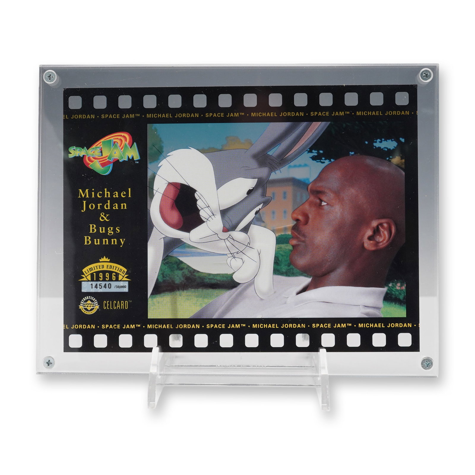 Upper Deck Space Jam Michael Jordan CelCard: Upper Deck Space Jam Michael Jordan and Bugs Bunny CelCard, limited edition 1996. Features a transparent acetate cel image over a printed background with a filmstrip border. Serial numbered 14540 /