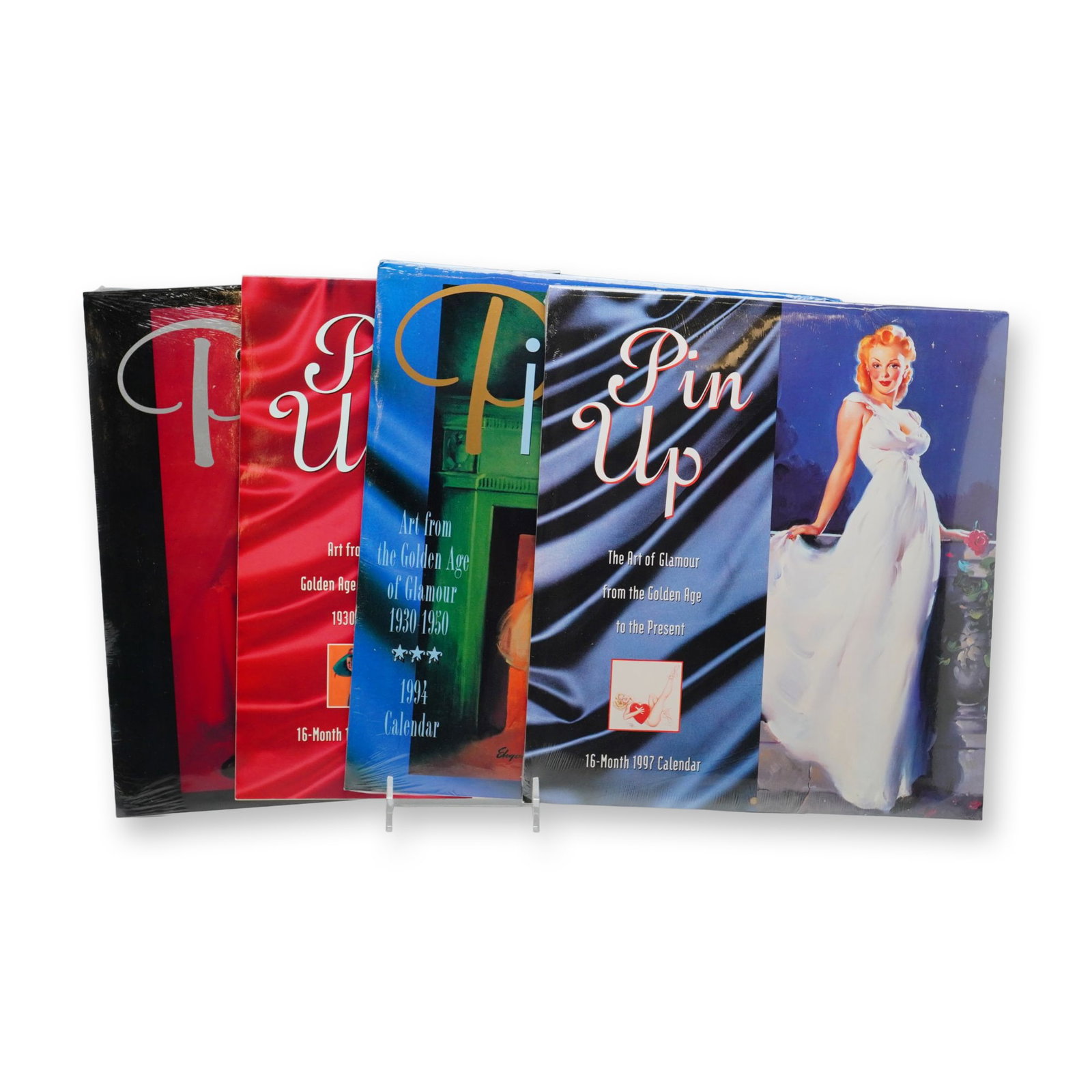 4pc Avalanche Publishing Vintage Style Pin Up Calendars: This collection consists of four vintage-style wall calendars published by Avalanche Publishing of Torrance, California. The set includes calendars for the years 1994, 1995, 1996, and 1997. These item