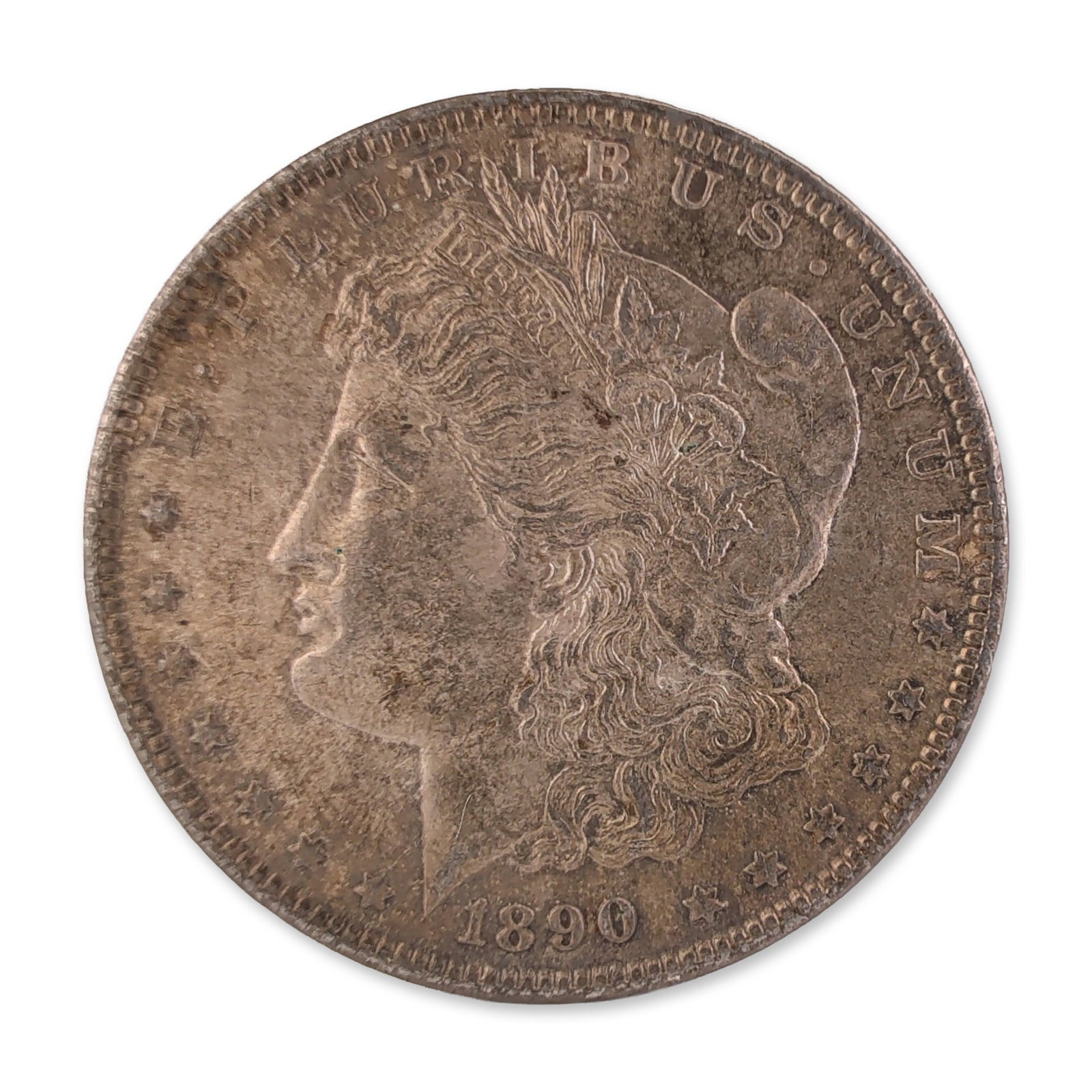 1890 US Morgan One Dollar Silver Coin, Circulated: US Morgan silver dollar dated 1890, struck at the Philadelphia Mint. This silver coin features the Liberty head design on the obverse with the Latin legend E PLURIBUS UNUM and thirteen stars. The