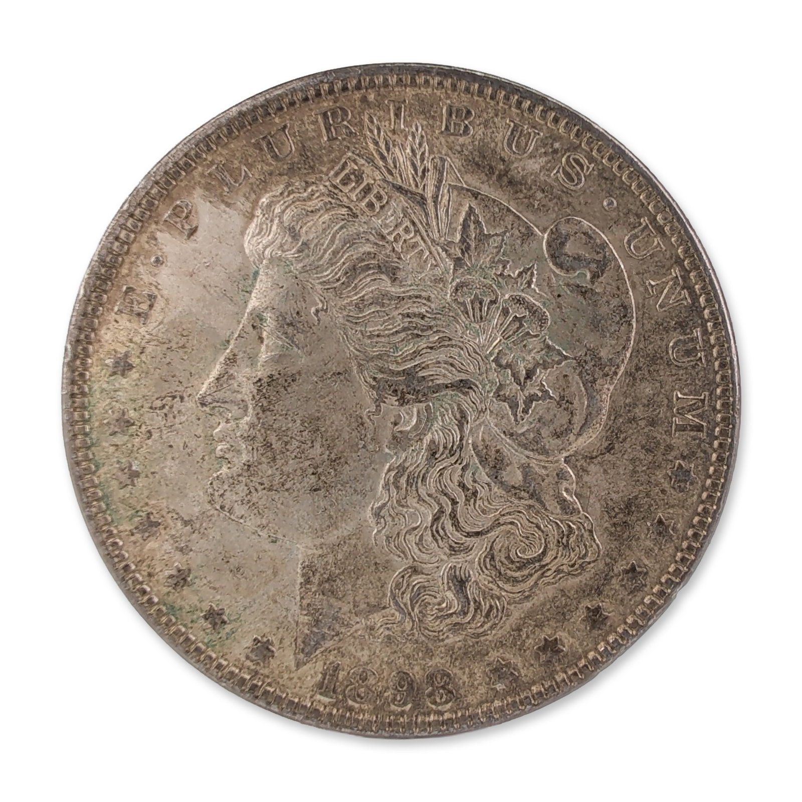 1898 US Morgan One Dollar Silver Coin, Circulated: US 1898 Morgan Silver Dollar, KM#110. Struck in 90 percent silver and 10 percent copper at the Philadelphia Mint. Standard George T. Morgan design featuring a Liberty head obverse and heraldic eagle