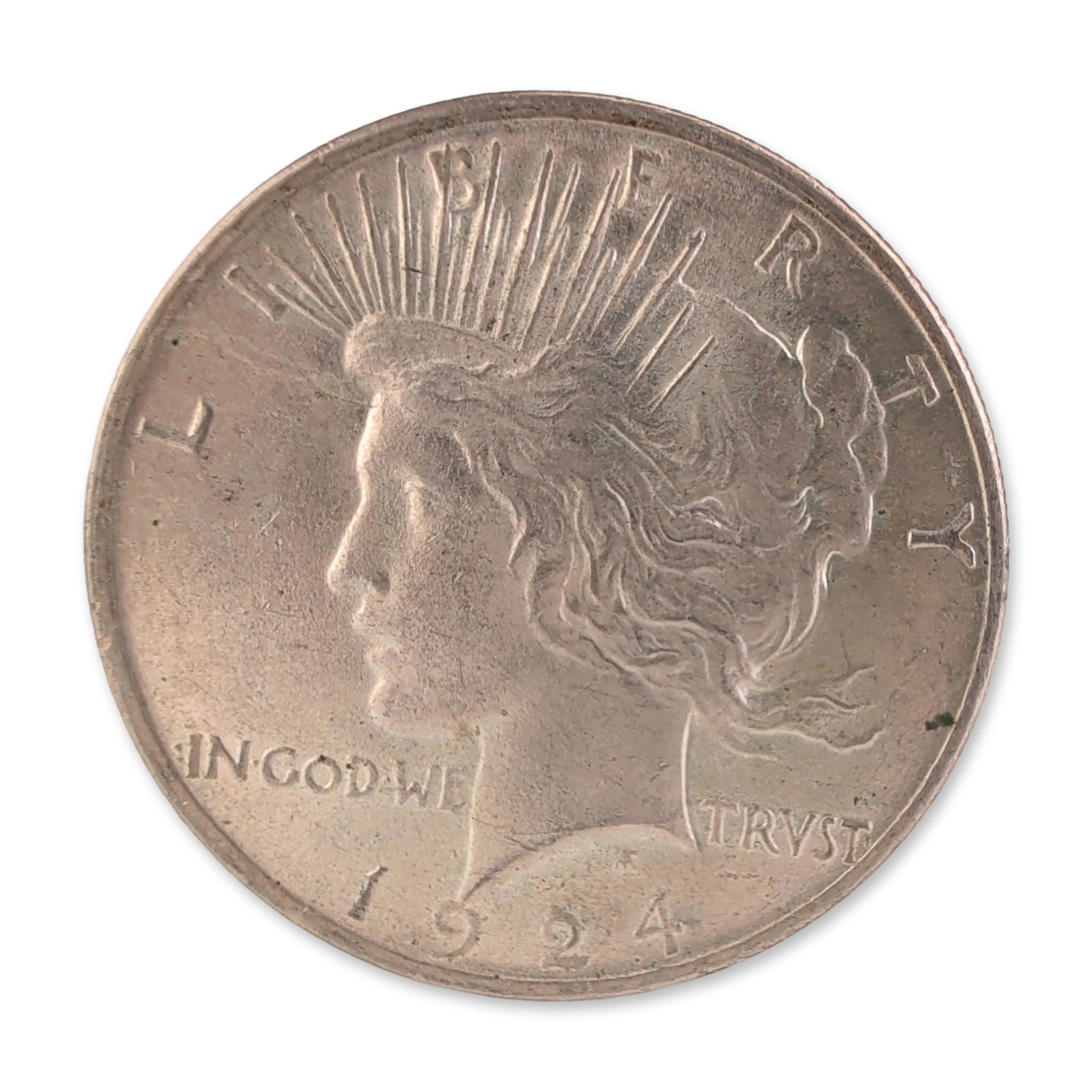 1924 US Peace One Dollar Silver Coin, Circulated: 1924 US Peace Dollar struck at the Philadelphia Mint. Composed of 90 percent silver with a reeded edge. The obverse features a left-facing profile of Liberty wearing a radiate crown with inscriptions 