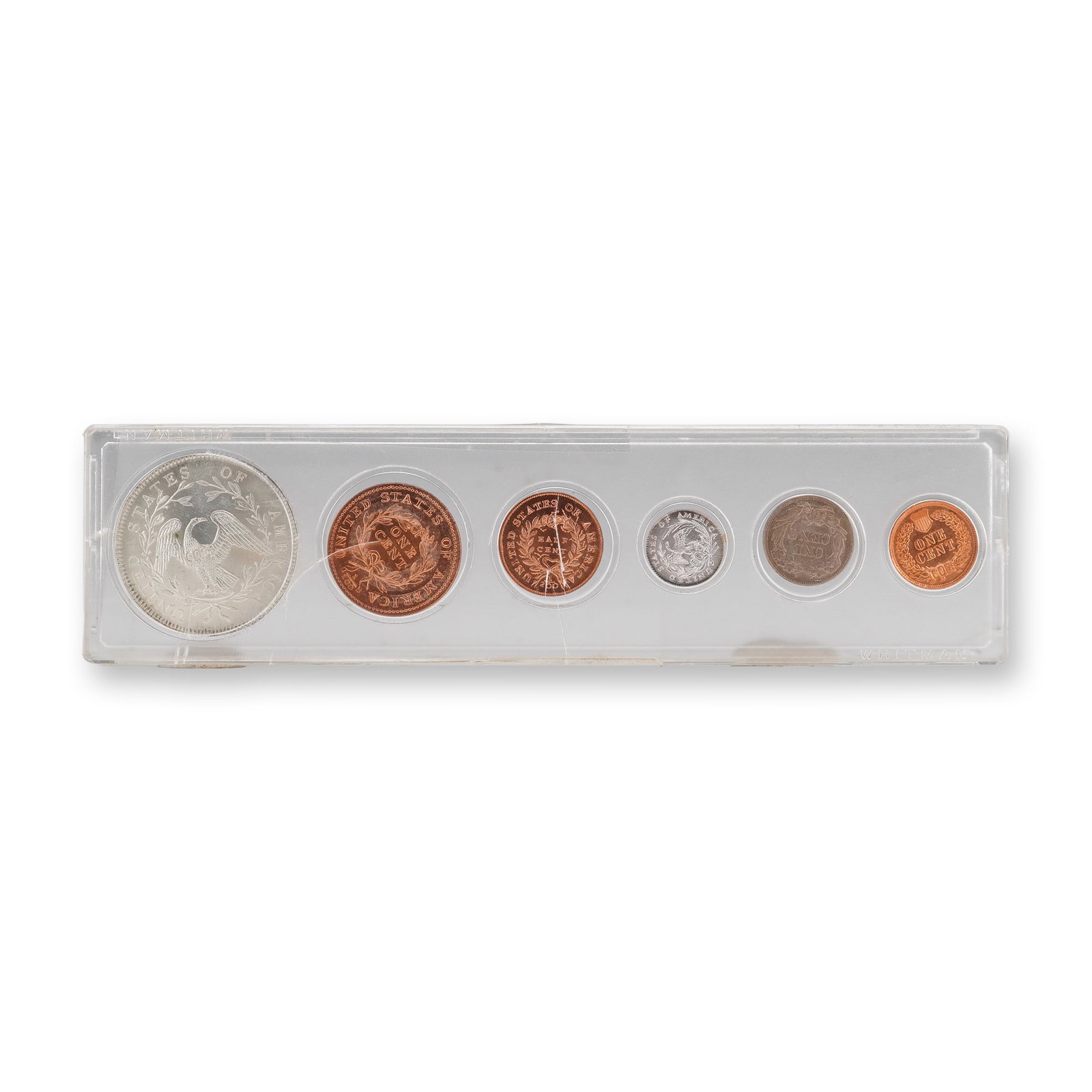 Silver and Copper Replica Set of Early U.S. Coin Designs: A modern replica coin set featuring six pieces modeled after iconic early United States coin designs, housed in a clear hard-plastic display holder. The set includes silver-tone and copper-tone copies