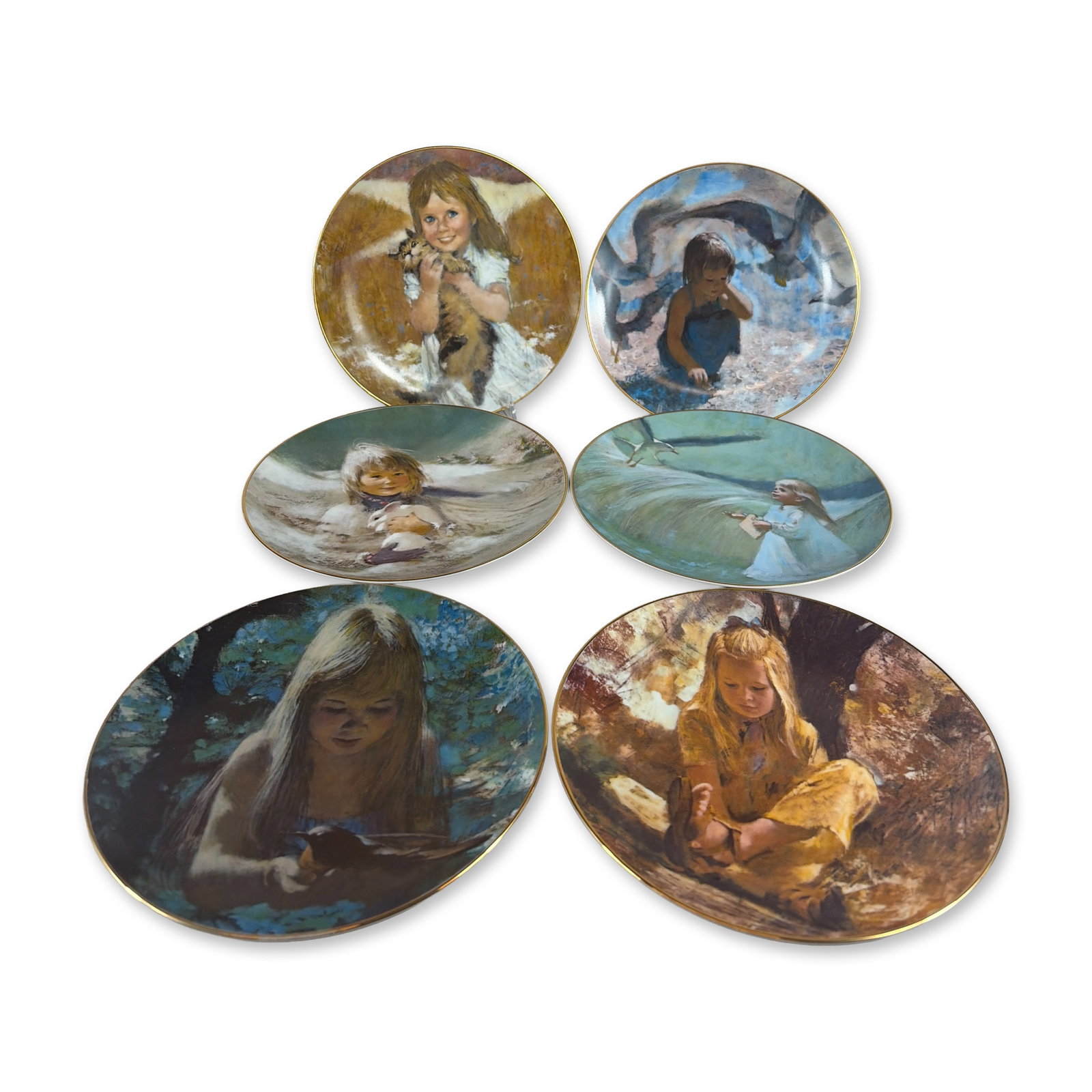 Set of Six Viletta Precious Moments Collection Thornton Utz Fine China Plates: Designs depict young children with animals and coastal scenery, finished with gold-gilt rims. Marks to the reverse of each include Viletta USA backstamps with individual plate titles, series informati