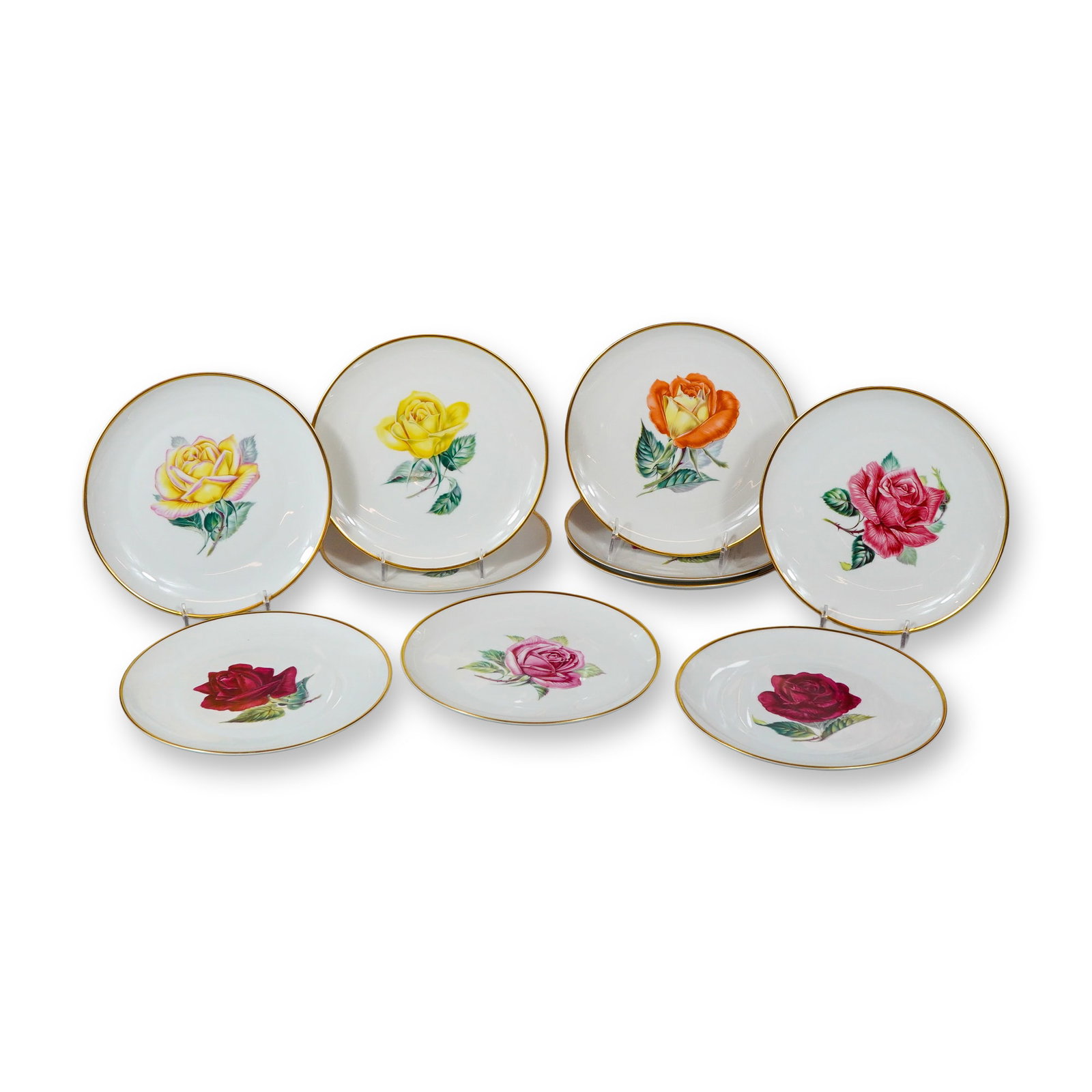 10pc Heinrich and Co. Rose Porcelain Plates: Heinrich and Co., Selb, Bavaria. Set of ten porcelain plates from the Golden Crown E7R collection, each featuring a different large-scale botanical rose motif. The transfer-printed designs include yel