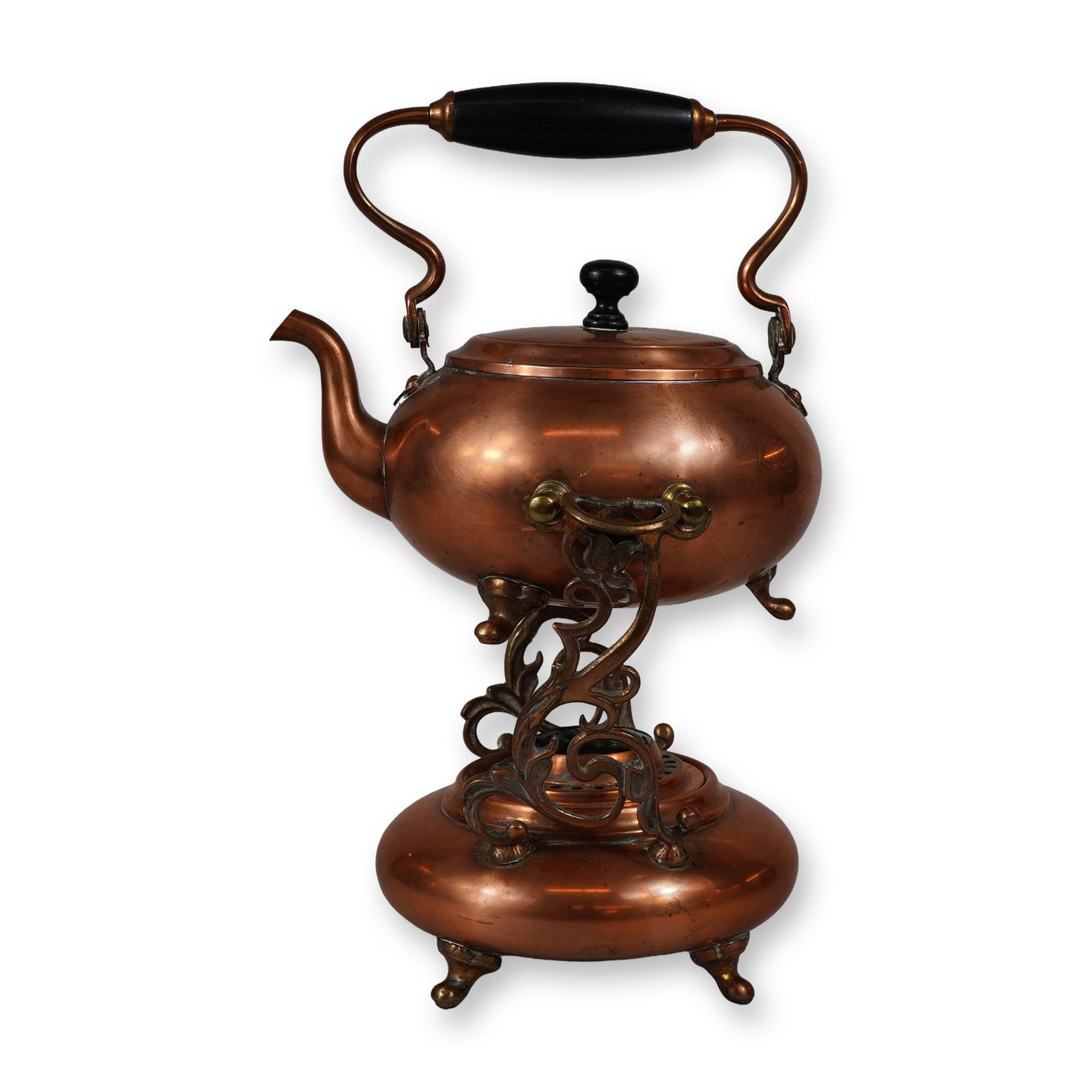 S. Sternau & Co. S&C Trademark Copper Teapot with Stand and Burner: An antique S&C Trademark copper teapot with stand and burner produced by S. Sternau & Co. of Brooklyn, New York. The set includes a globular copper kettle with a curved spout, a hinged overhead handle