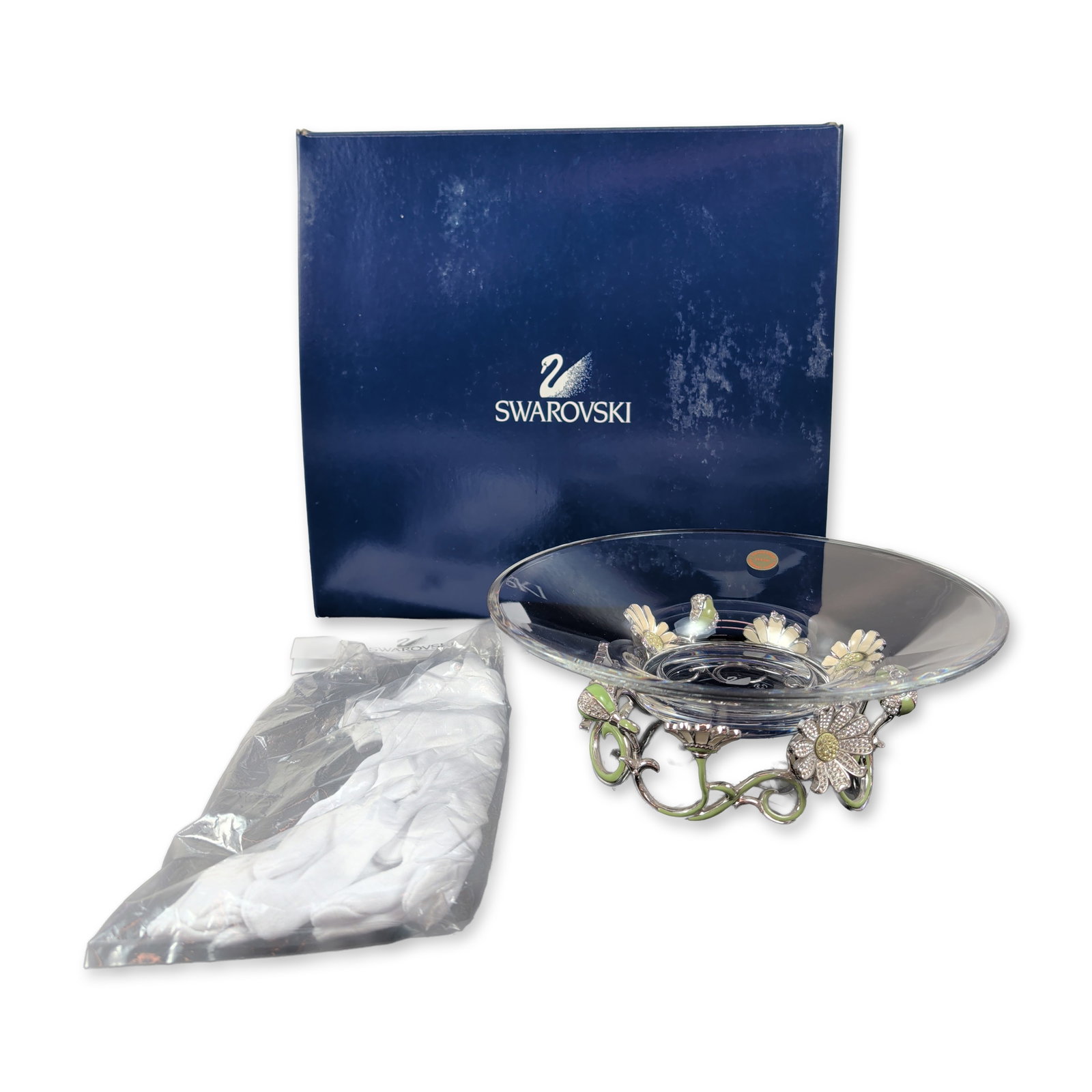 Swarovski Crystal 2005 Mother's Day Daisy Bowl: This Swarovski decorative glass bowl, released for Mother's Day 2005, features a shallow clear glass bowl set on an ornate silver-toned metal stand with an openwork floral design of daisies and scroll