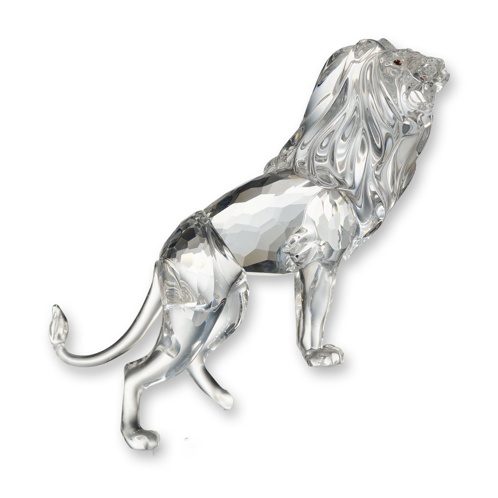 Swarovski Crystal Lion Standing on Rock Figurine: Swarovski lead crystal figurine depicting a standing lion, model number 269377. The figure features a faceted clear crystal body, a molded and frosted crystal mane, and a raised tail, with eyes accent