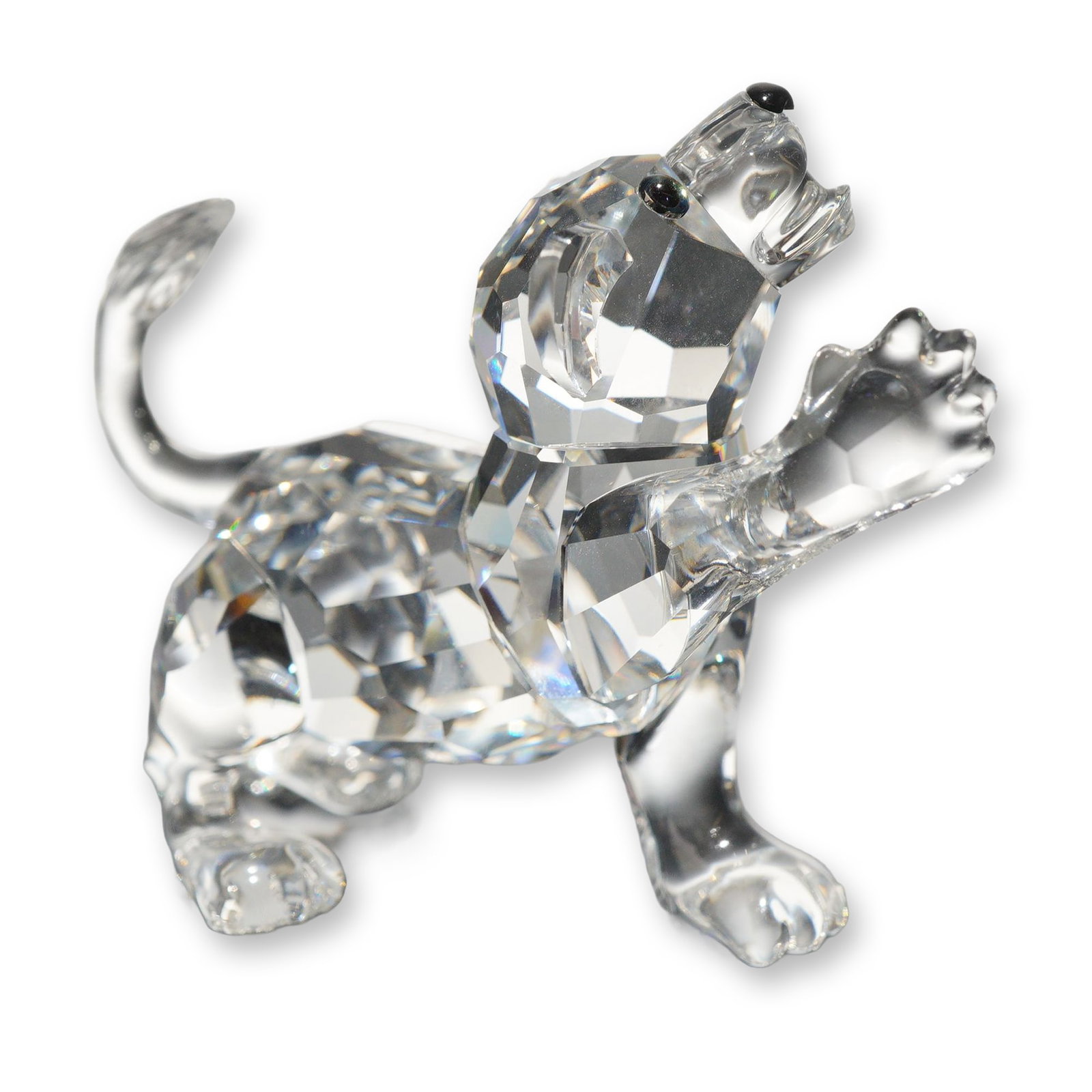 Swarovski Silver Crystal Lion Cub Figurine: Swarovski Silver Crystal lion cub figurine, modeled in a dynamic standing pose with a raised front-right paw, tilted head, open mouth, and curved tail. Constructed from faceted and molded clear lead c