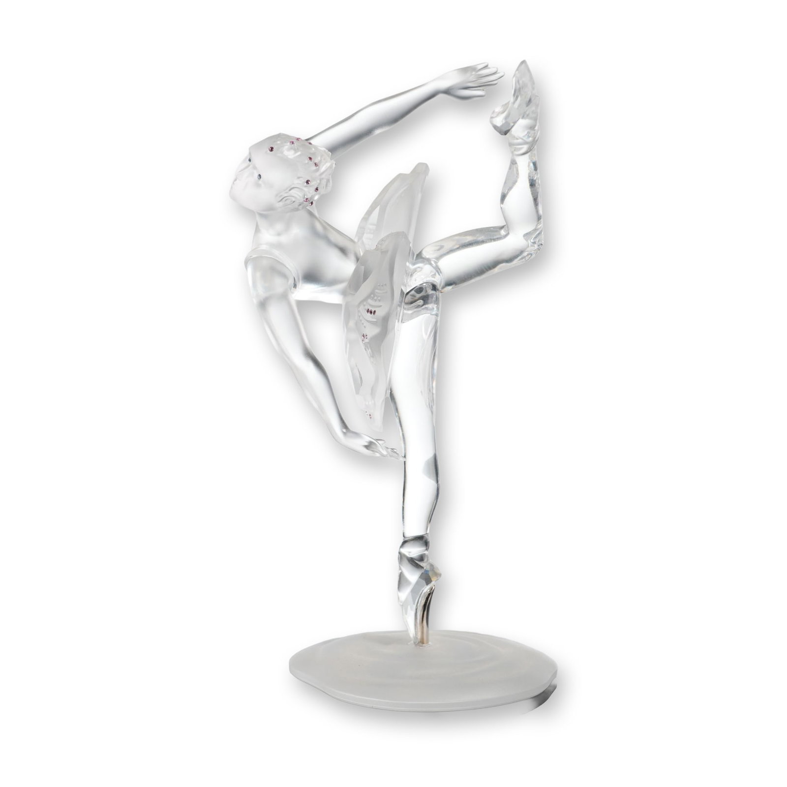 Swarovski Crystal Figurine, Ballerina: Swarovski crystal ballerina figurine in clear and frosted lead crystal, depicting a dancer captured en pointe. The figure features a clear polished crystal body and limbs with a frosted crystal tutu a