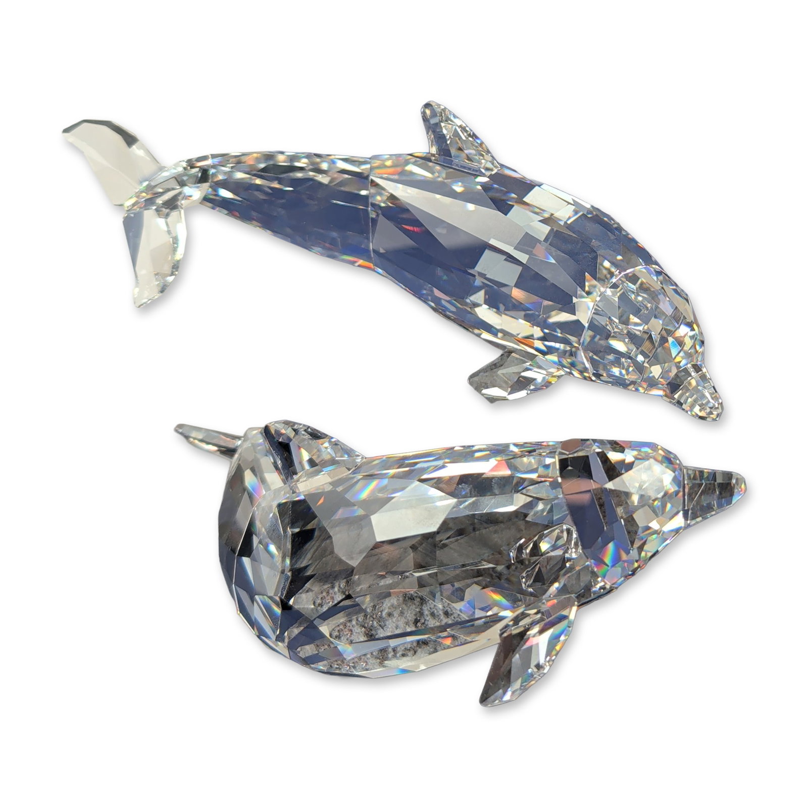 Swarovski Crystal Soulmates Dolphins Figurine, Ocean of Friendship: This retired Swarovski Soulmate Dolphin sculpture was part of the Soulmates theme group. The pair of graceful dolphins dance playfully and represent the Ocean of Friendship. Famous for their friendlin