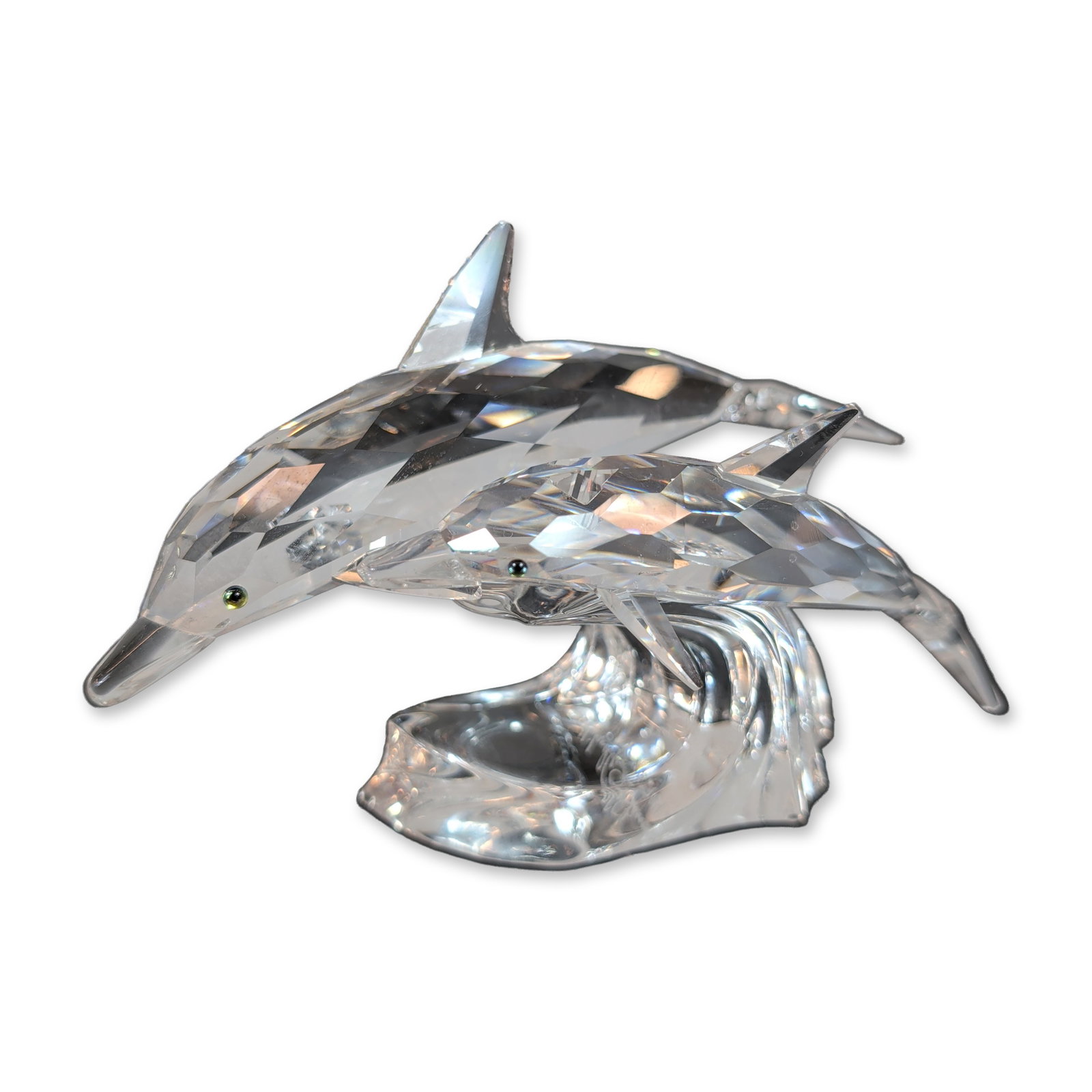 Swarovski SCS 1990 Lead Me The Dolphins Crystal Figurine: Swarovski Crystal Society (SCS) 1990 Annual Edition titled The Dolphins. Figurine in faceted lead crystal depicting a pair of dolphins leaping over a stylized frosted crystal wave base. Underside feat