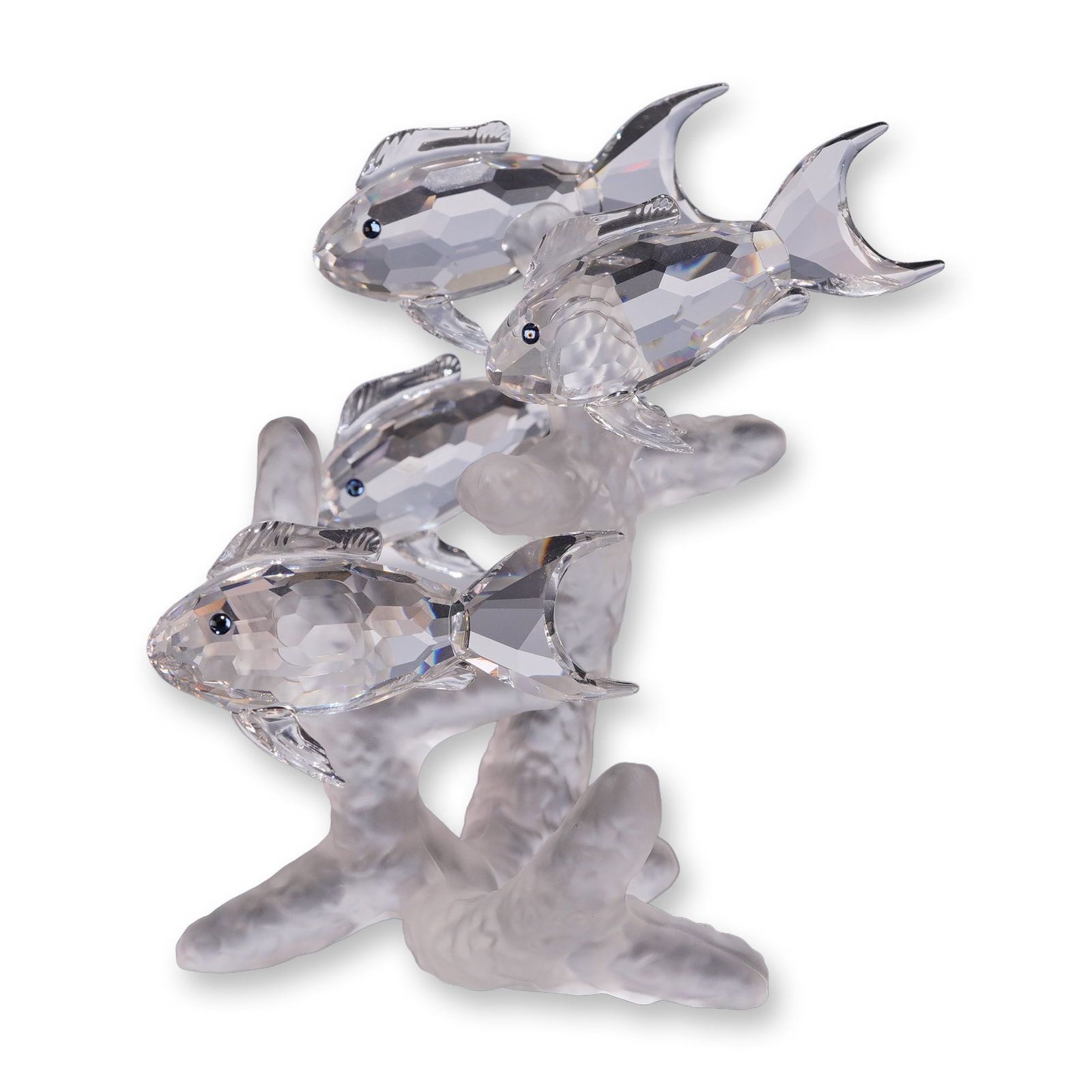 Swarovski Crystal Figurine, School of Fish: School of Fish figurine from the Aquatic Worlds collection, featuring four faceted clear crystal fish with inset dark eyes arranged swimming around a central frosted crystal coral support structure. A