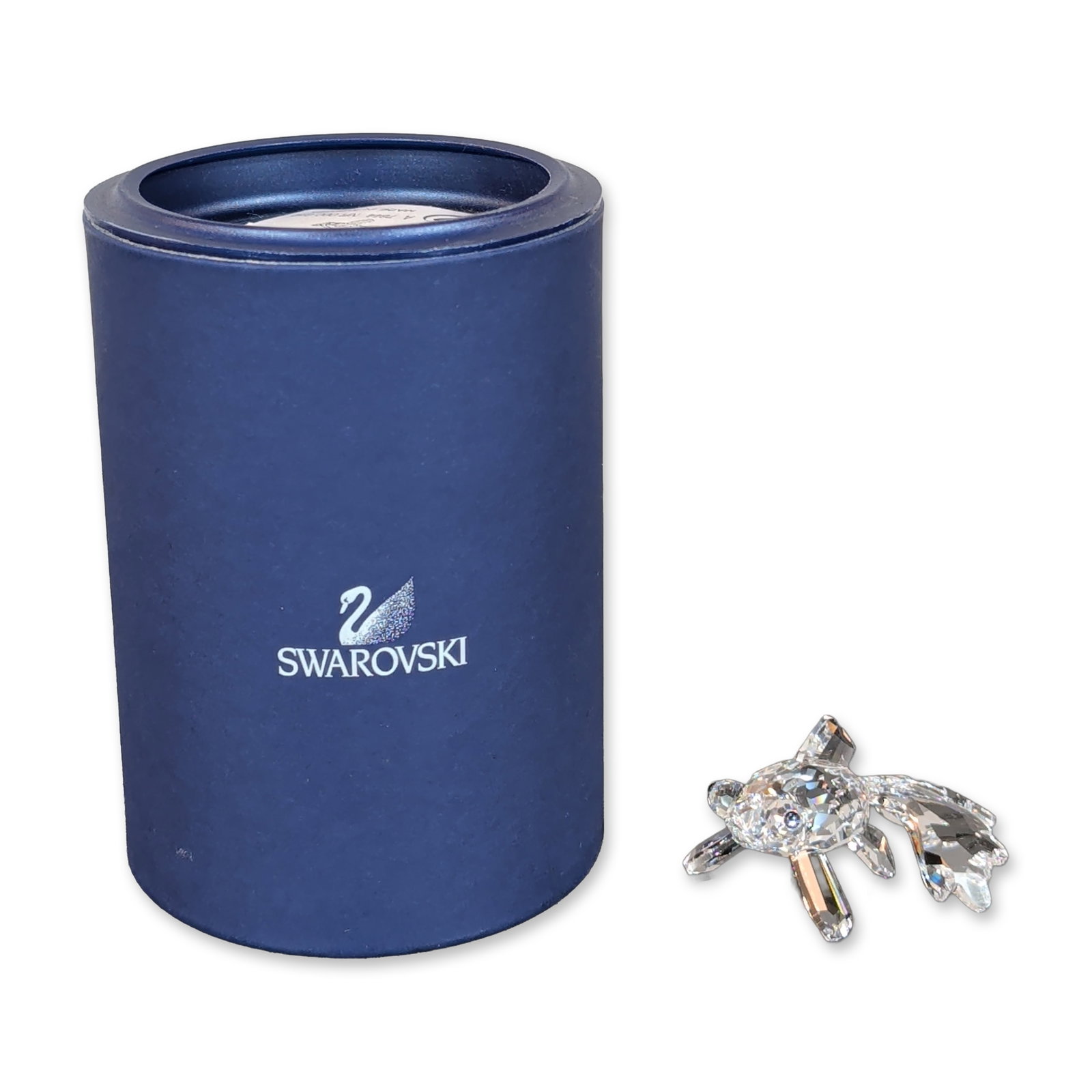 Swarovski Crystal Telescope Fish Figurine: Swarovski faceted crystal figurine of a telescope goldfish, featuring a multi-faceted body with protruding eyes inset with dark stones. The form includes flowing dorsal, pelvic, and large caudal fins.