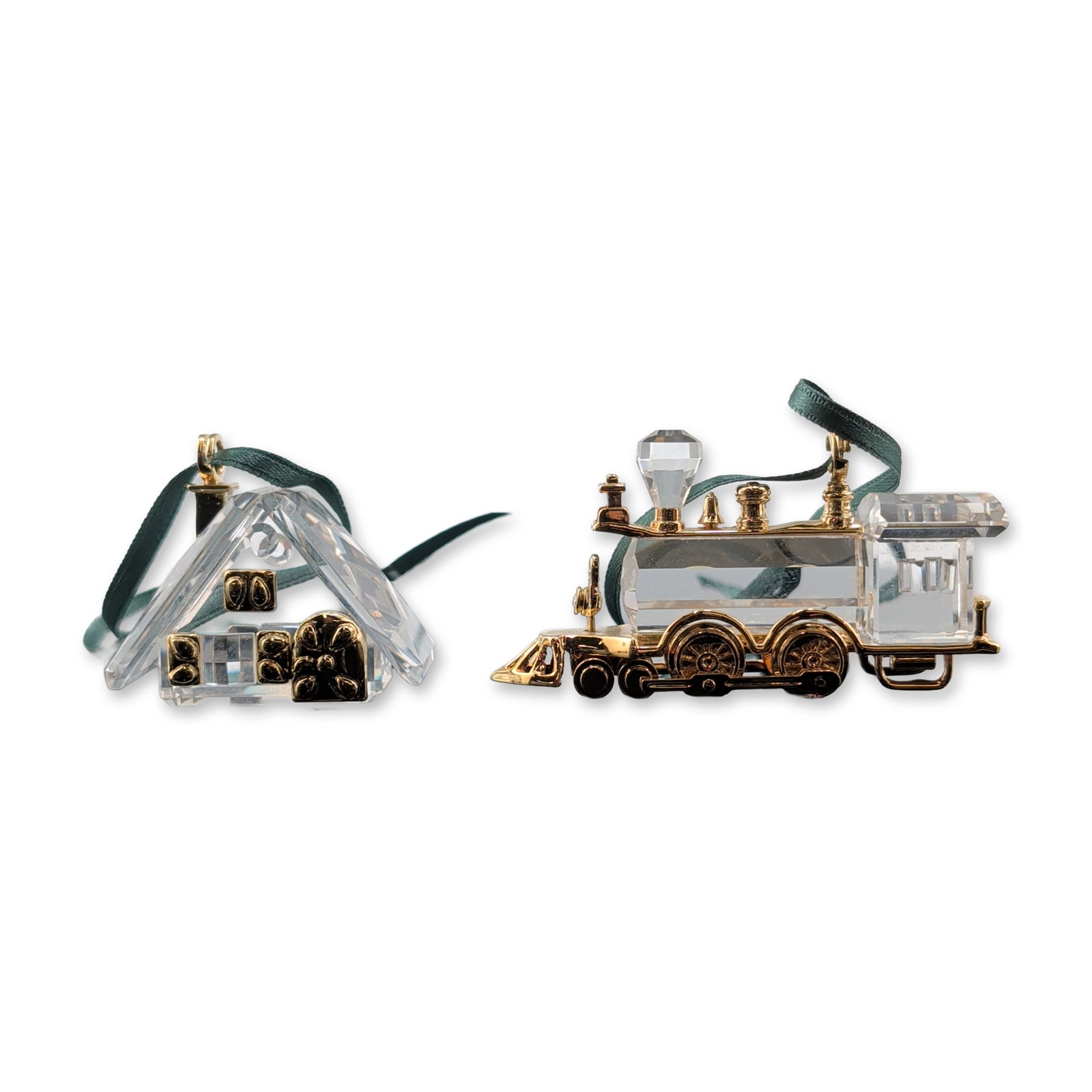 2pc Swarovski Crystal Memories Hanging Ornaments: Two Swarovski hanging ornaments from the Crystal Memories collection, featuring faceted clear crystal and gold-tone metal accents. Includes one miniature steam locomotive with a faceted crystal boiler