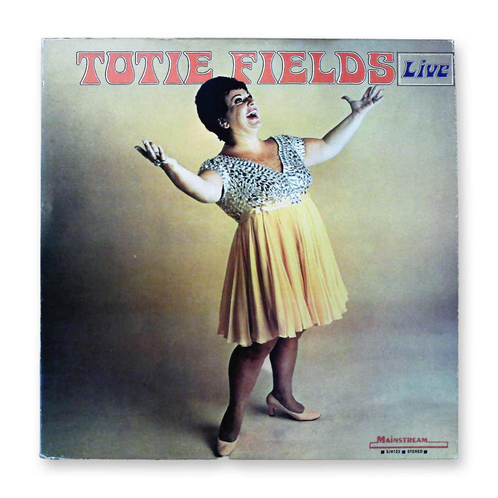 Totie Fields Live Mainstream Records Stereo LP S/6123: A vintage comedy album by Totie Fields titled TOTIE FIELDS Live, released on Mainstream Records, catalog number S/6123 (STEREO). The lot includes the original 12-inch cardboard LP sleeve and one