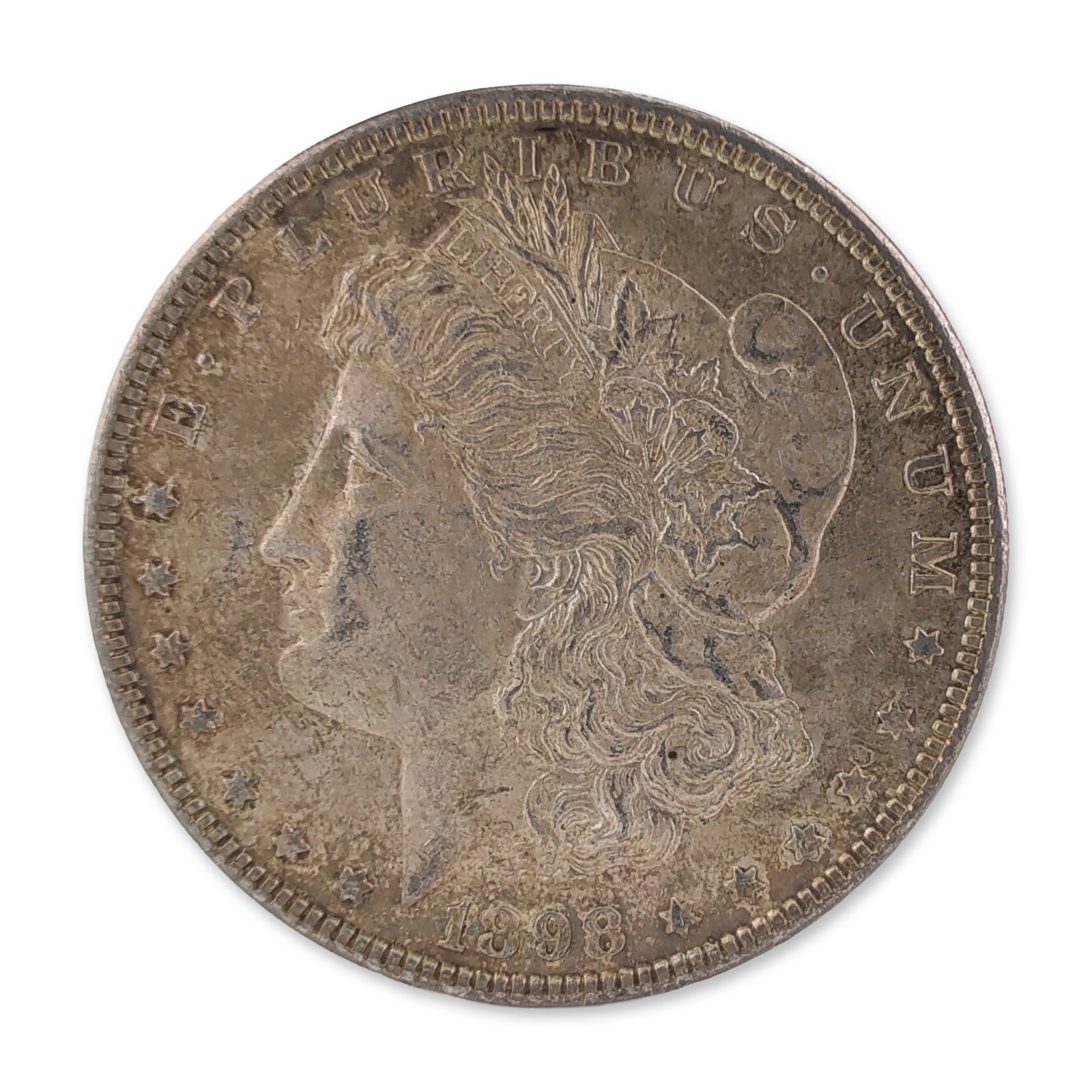 1898 US Morgan One Dollar Silver Coin, Circulated: US Philadelphia Mint 1898 Morgan silver dollar. This specimen is struck in 90 percent silver and 10 percent copper, featuring George T. Morgan designs including a Liberty head obverse and a heraldic e