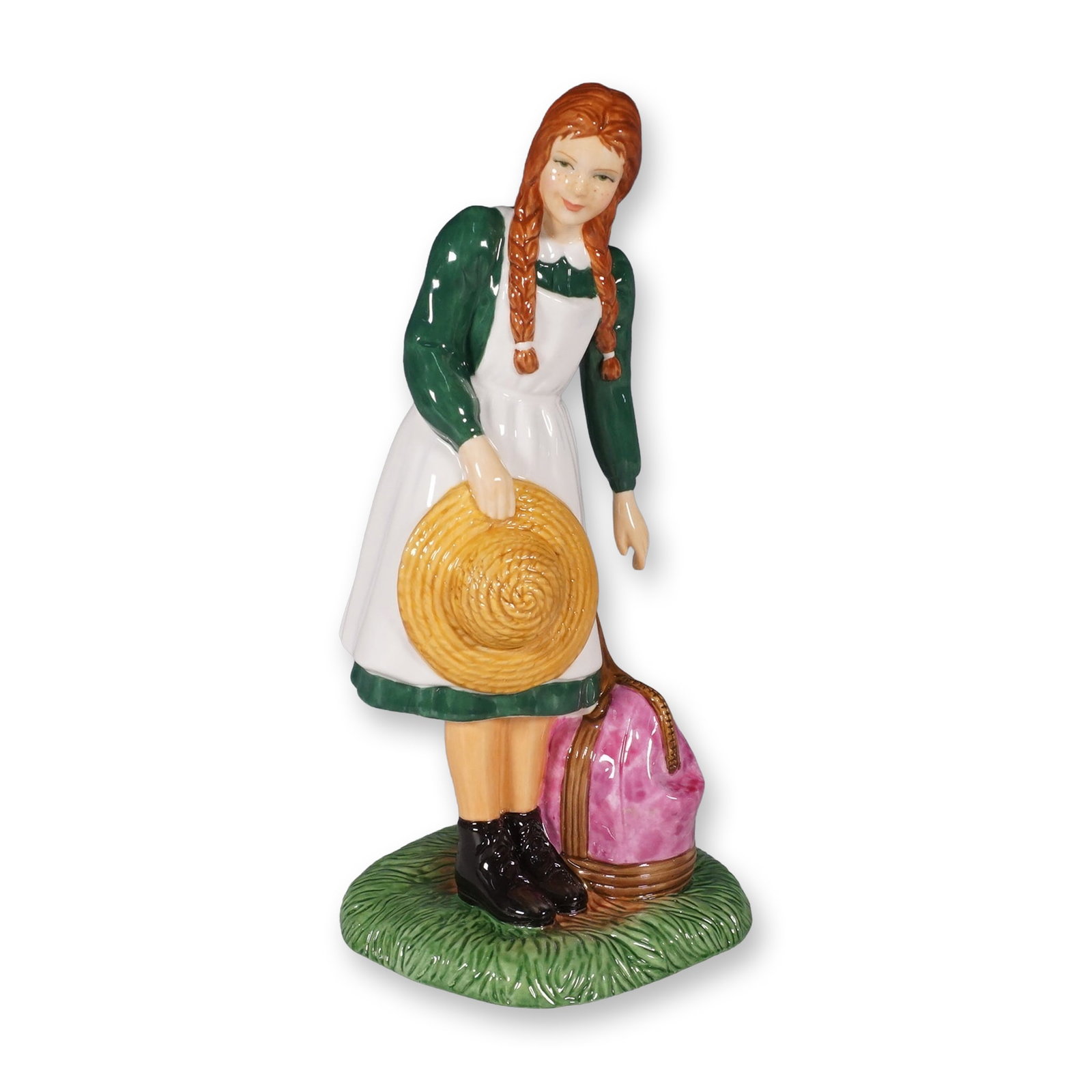 Royal Doulton Figurine, Anne Arrives at Green Gables HN5225: Royal Doulton figurine Anne Arrives at Green Gables HN5225 from the Pretty Ladies collection. This limited edition piece is number 695 of 800 and depicts Anne Shirley in her iconic green dress, white 
