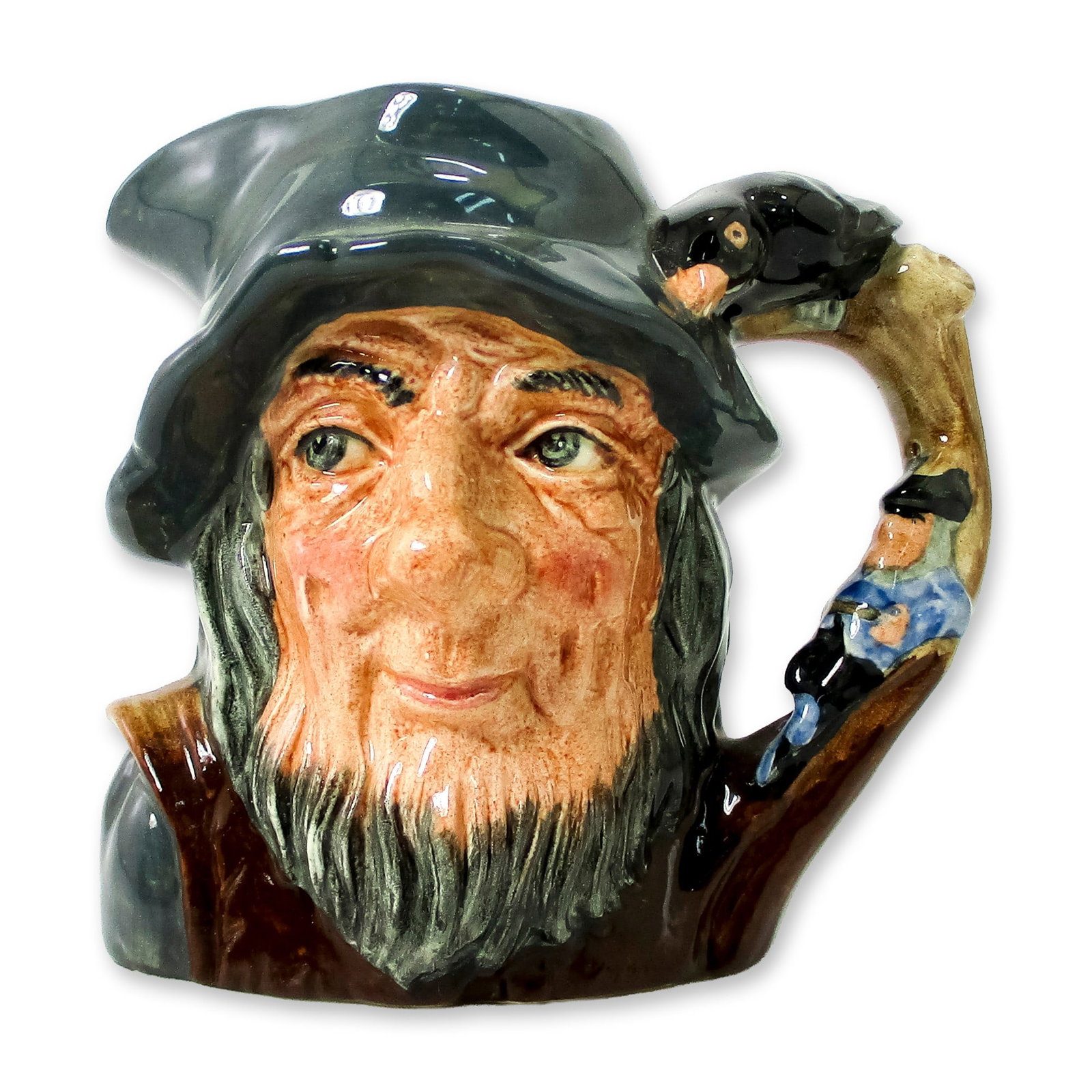 Rip Van Winkle D6463 - Small - Royal Doulton Character Jug: Variation One. Grey-blue cap; brown robes; figure dressed in blue resting against a tree. In 1820, the American writer Washington Irving wrote the story of Rip Van Winkle, based on legends he had hear