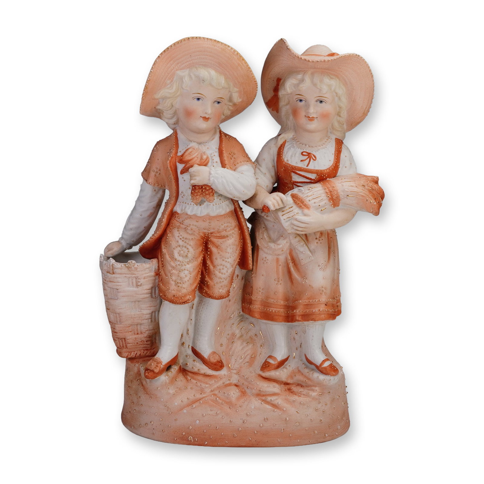 German Porcelain Rural Boy and Girl Figurine: Modeled in a matte porcelain finish, with a warm terracotta toned color wash. Continental figural sculpture portrays a young boy and girl dressed in stylized rural attire. The pair stands side by side