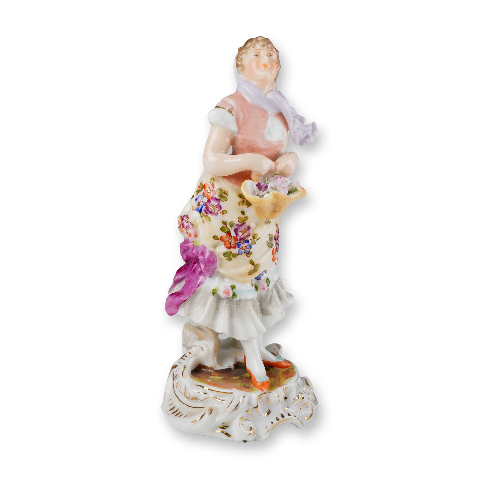 Volkstedt Porcelain Figurine, Woman Holding Basket of Flowers: Charming 5.5-inch porcelain figurine depicting a young woman in 18th-century attire, delicately holding a basket overflowing with hand-modeled flowers. The figure is finely hand-painted in soft pastel