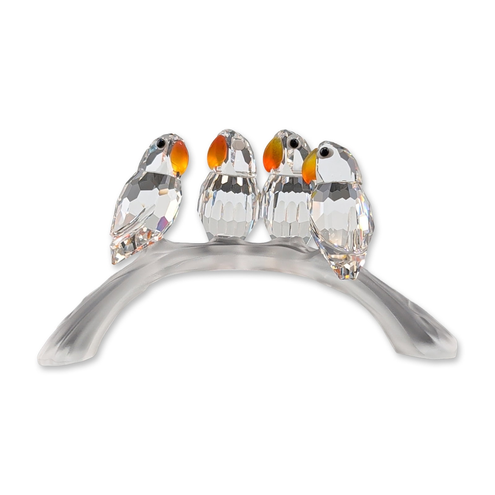 Swarovski Crystal Baby Lovebirds Figurine: Swarovski Silver Crystal Baby Lovebirds figurine from the Feathered Beauties theme group. The figurine features four clear faceted lead crystal birds with orange-tinted beaks and black bead eyes, perc