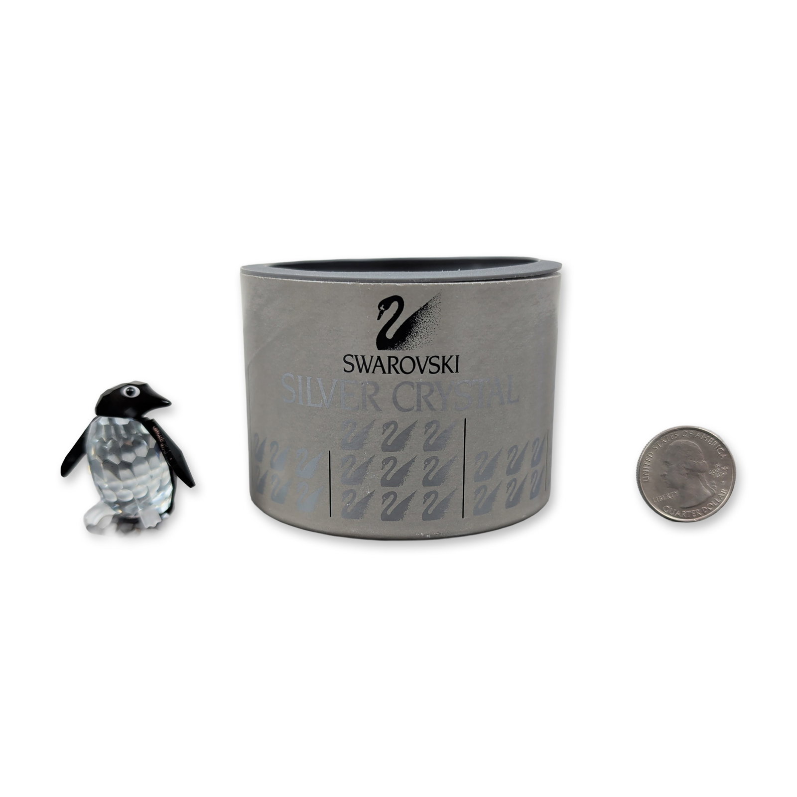 Swarovski Crystal Figurine, Madame Penguin with Ice Base: This Swarovski crystal Madame Penguin, part of the enchanting “Kingdom of Ice and Snow” collection, is crafted from clear and black crystal with delicate white crystal accents around its eyes.