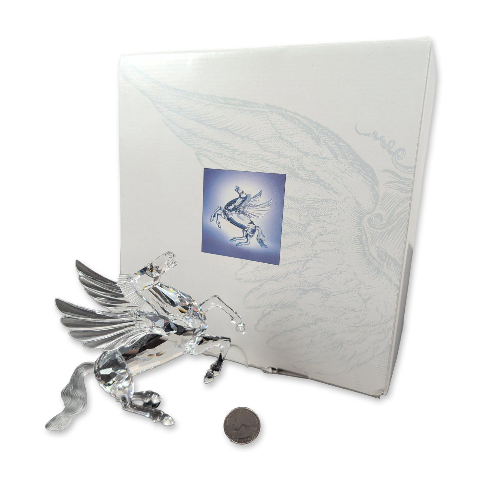 Swarovski SCS 1998 Annual Edition Crystal Figurine, Pegasus: Swarovski 1998 Annual Edition The Pegasus crystal figurine, part of the Fabulous Creatures series. Construction features faceted clear lead crystal with frosted satin crystal accents to the mane,