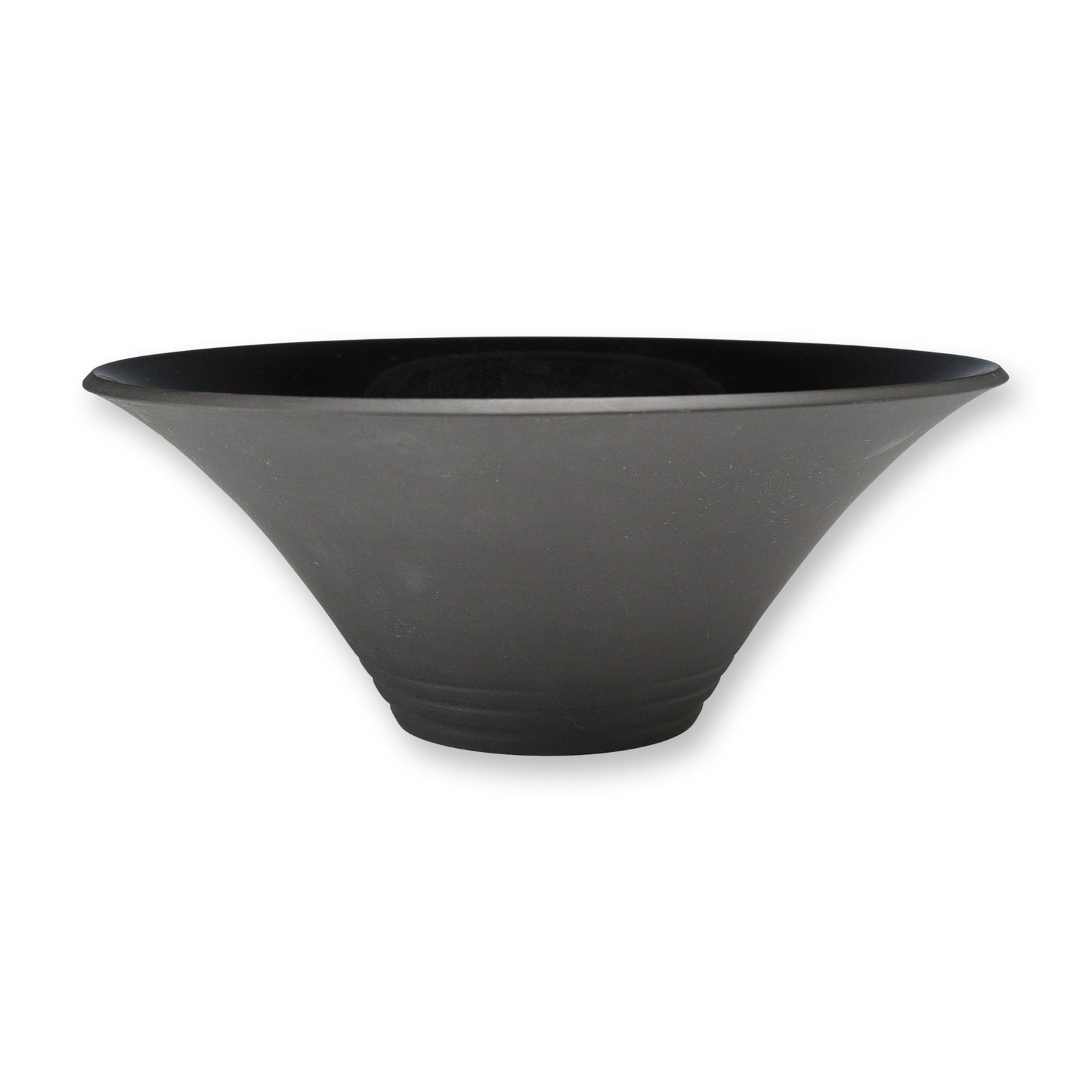 Nick Munro for Wedgwood Black Basalt Bowl: Wedgwood black basalt stoneware bowl designed by Nick Munro, 1999. The large conical form features a flared rim and a stepped circular foot. The exterior is finished in a matte black basalt, while the