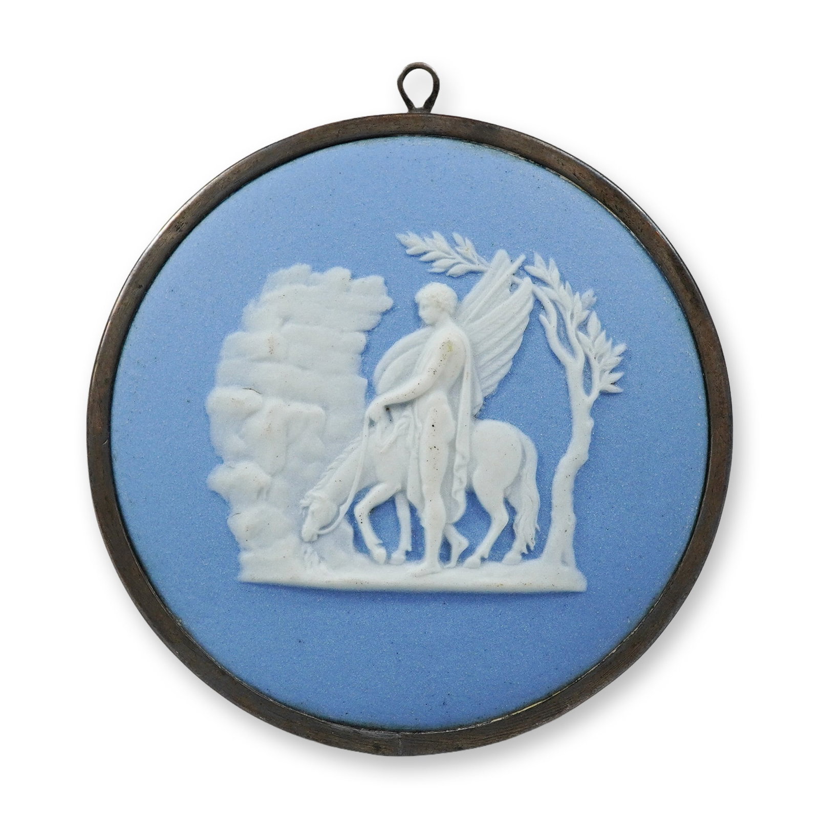 Wedgwood Blue Jasperware Medallion Depicting Pegasus and Bellerophon: This circular medallion is crafted from solid pale blue jasperware stoneware by the Wedgwood factory in Staffordshire, England. The face features a detailed white sprigged relief decoration in the