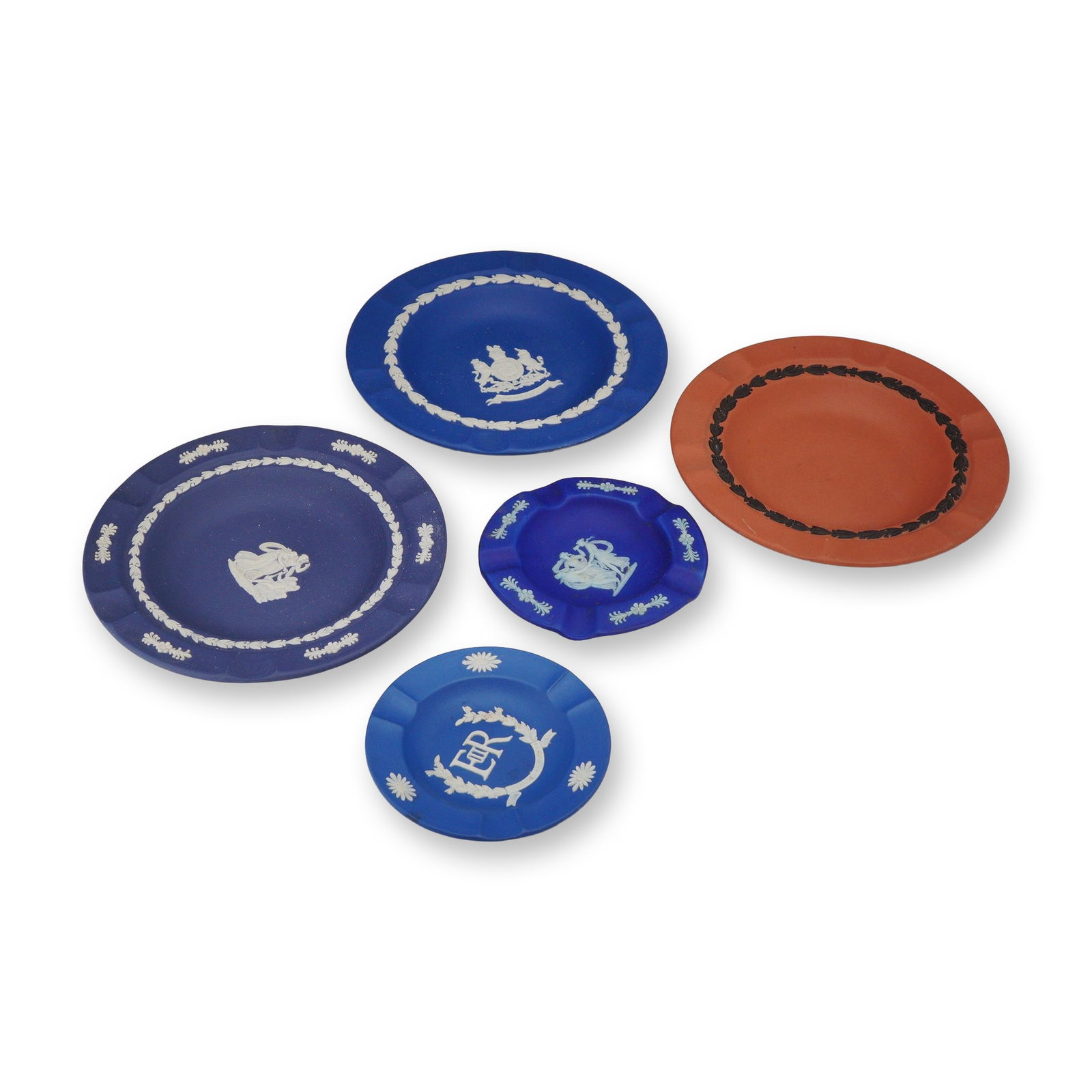 5pc Wedgwood Jasperware Ashtray and Pin Tray Collection: This set of five Wedgwood Jasperware decorative pieces includes an assortment of small plates, pin trays, and ashtrays. Manufactured in England, these items are crafted from unglazed stoneware featuri