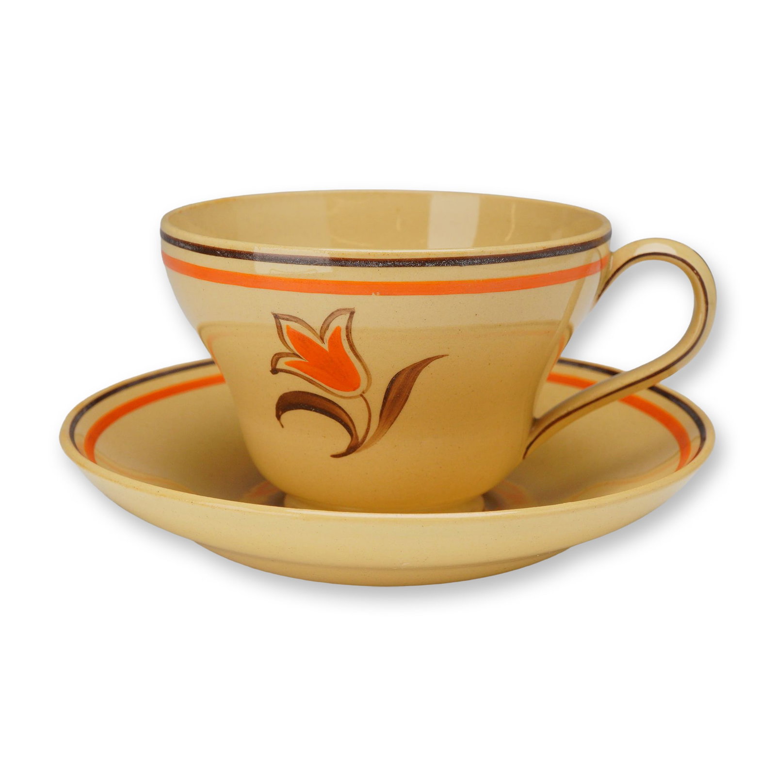 2pc Wedgwood Earthenware Cup and Saucer: This 2pc set includes an earthenware cup and a matching saucer produced by Wedgwood in England. The pieces are crafted from cream-colored earthenware with a light speckled glaze. The decoration featur