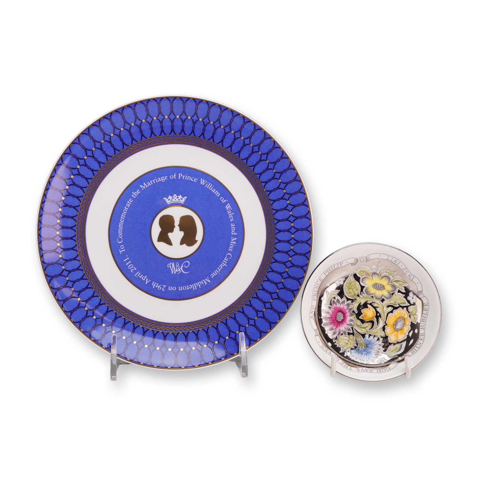 Two Wedgwood Bone China Royal Commemorative Items: This lot features two pieces of Wedgwood bone china produced to commemorate significant British royal events. The first item is a circular commemorative plate celebrating the marriage of Prince Willia
