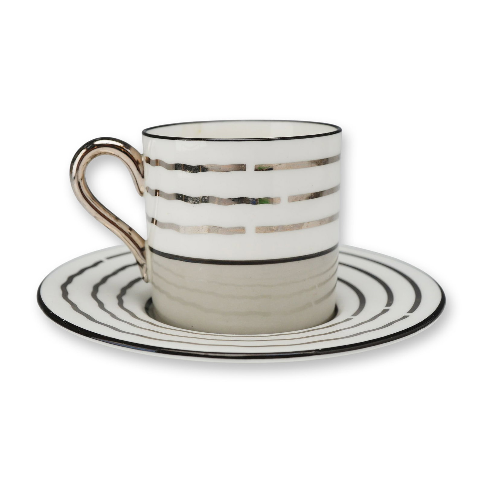2pc Wedgwood Bone China Striped Silver and Grey Demitasse and Saucer: The set features a modernist aesthetic with a cylindrical cup and matching saucer. The cup is decorated with a white upper section featuring three horizontal silver luster bands, separated from a soli