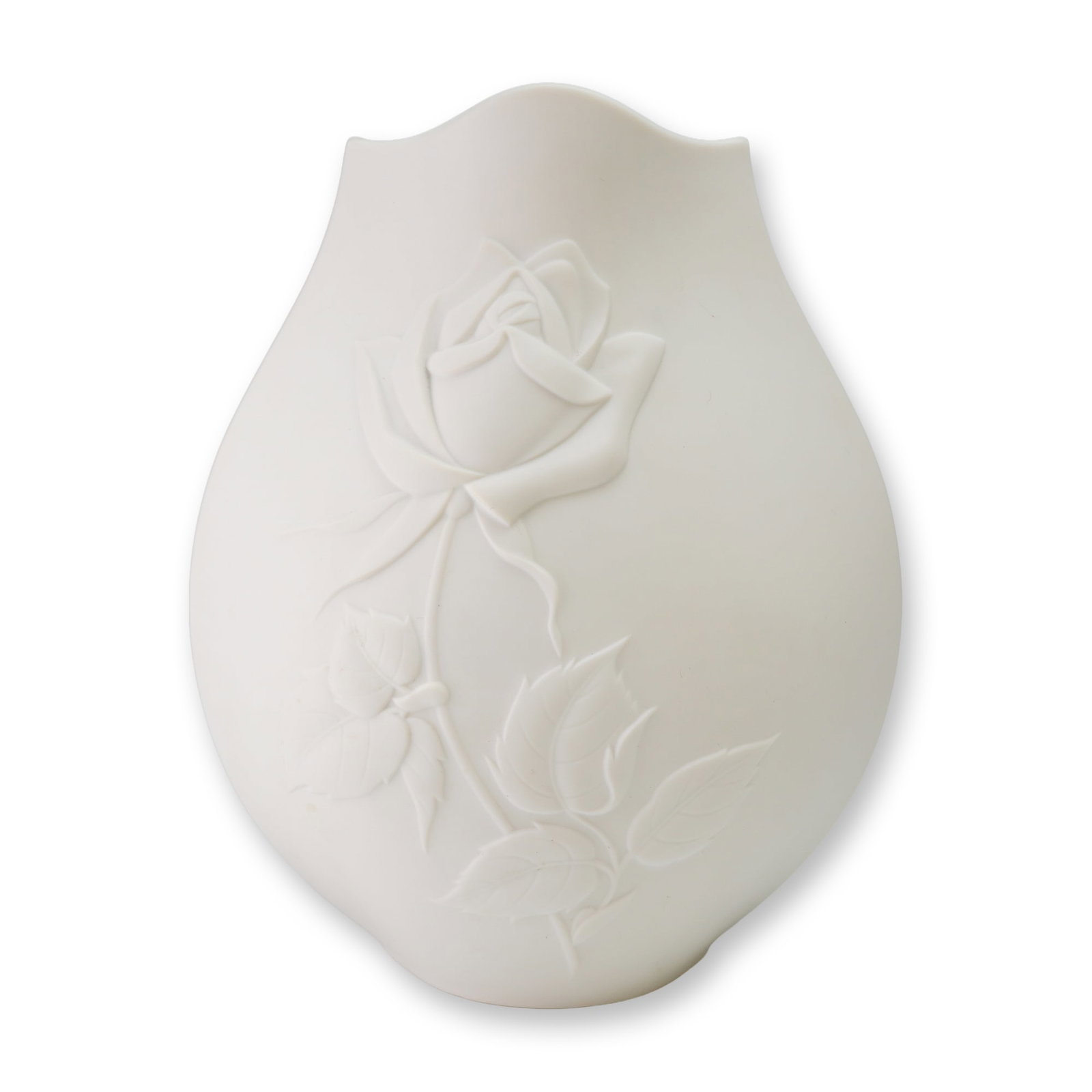 Noritake White Bisque Porcelain Rose Vase: The vessel features a bulbous, teardrop-shaped body terminating in a decorative scalloped rim. The obverse is adorned with a prominent bas-relief molded rose, complete with stem and foliage. The under