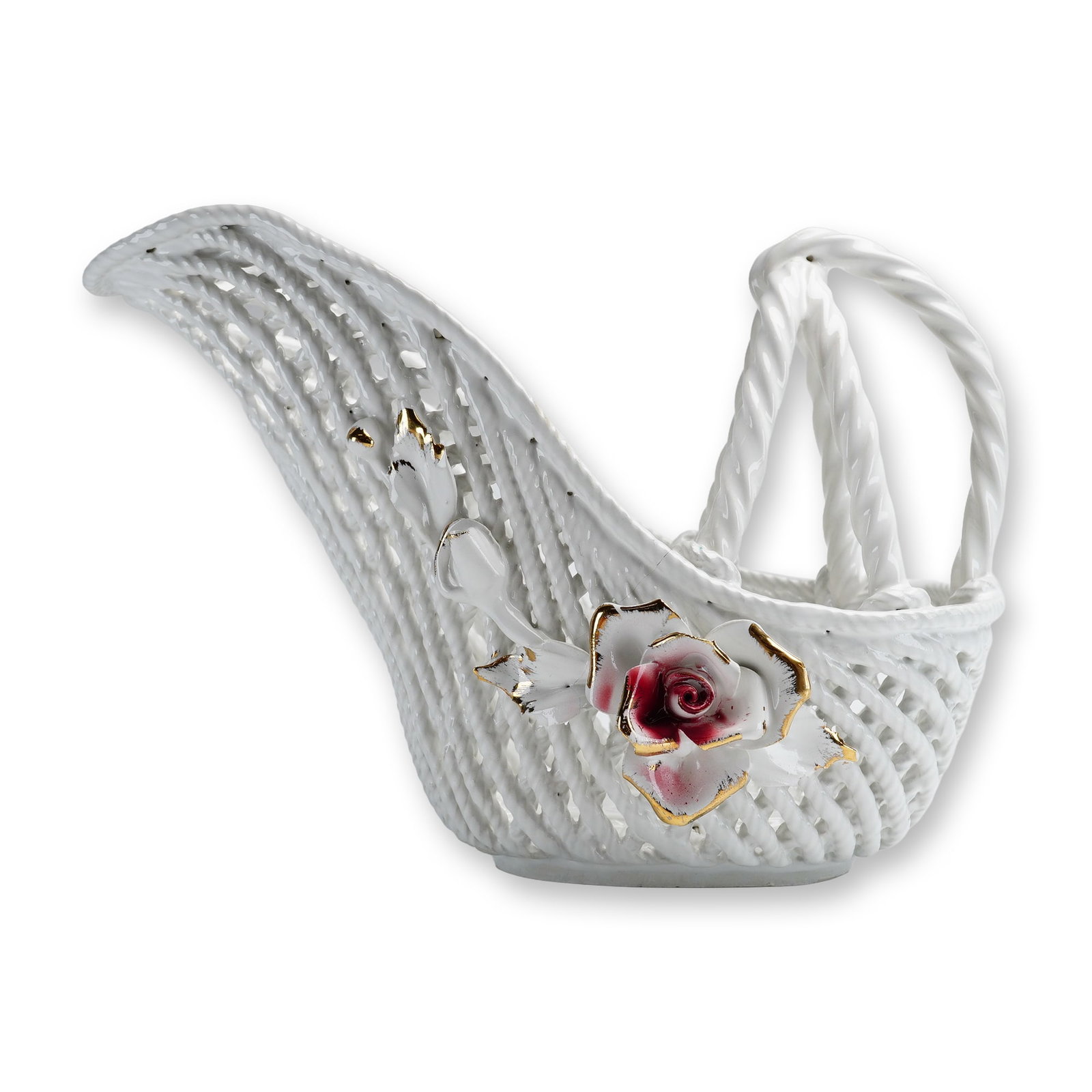 Italian Capodimonte Porcelain Reticulated Flower Basket: Capodimonte, Italy. Decorative basket in white glazed porcelain featuring a reticulated lattice body. The asymmetrical form includes a tall arched handle composed of three twisted strands. A large, ha