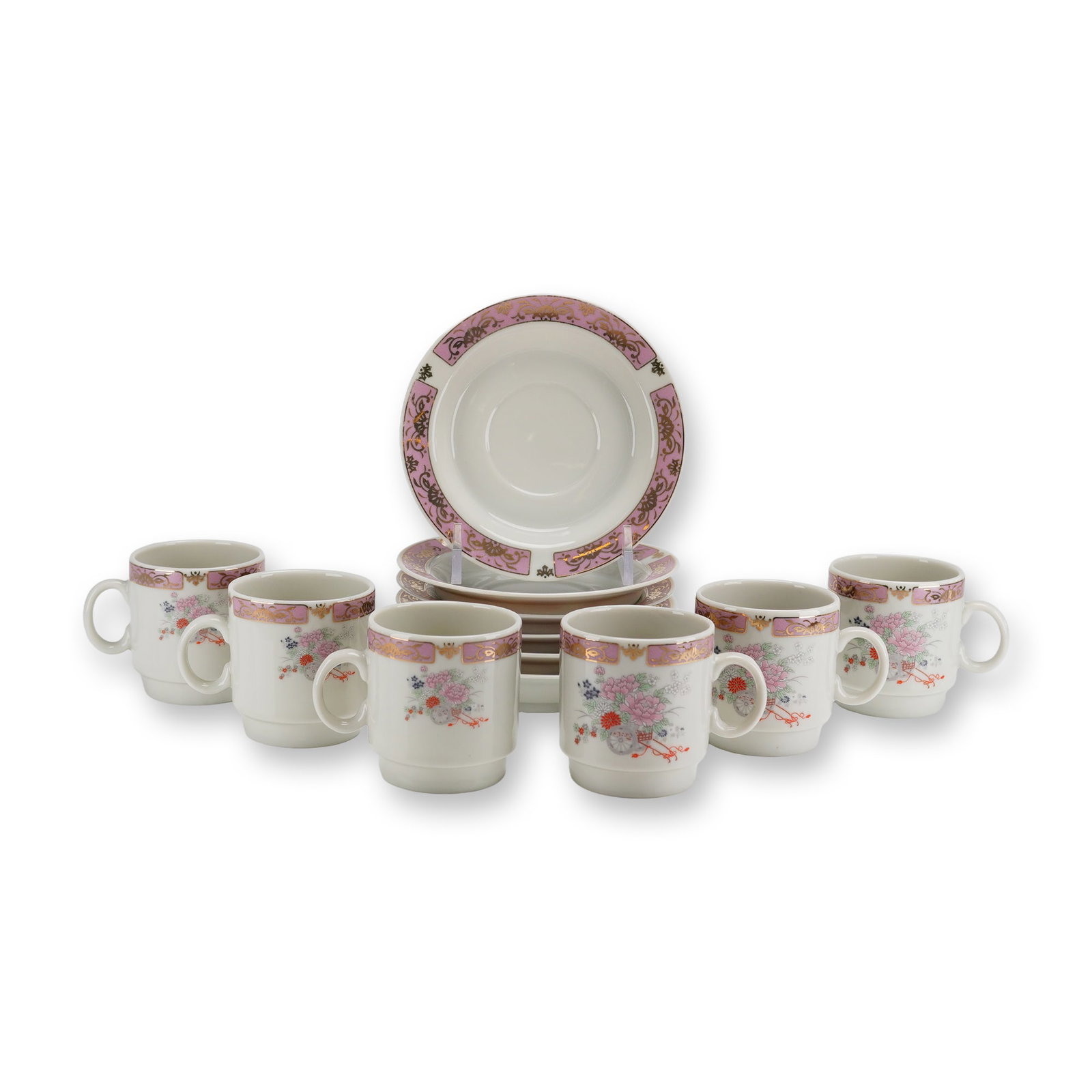 12pc Porcelain Demitasses Saucers with Flowers Motif: A set of twelve white porcelain demitasses and saucers featuring motifs depicting flowers with blossoms in shades of pink, red, and blue. A decorative pink border accented with gilded scrolling foliat