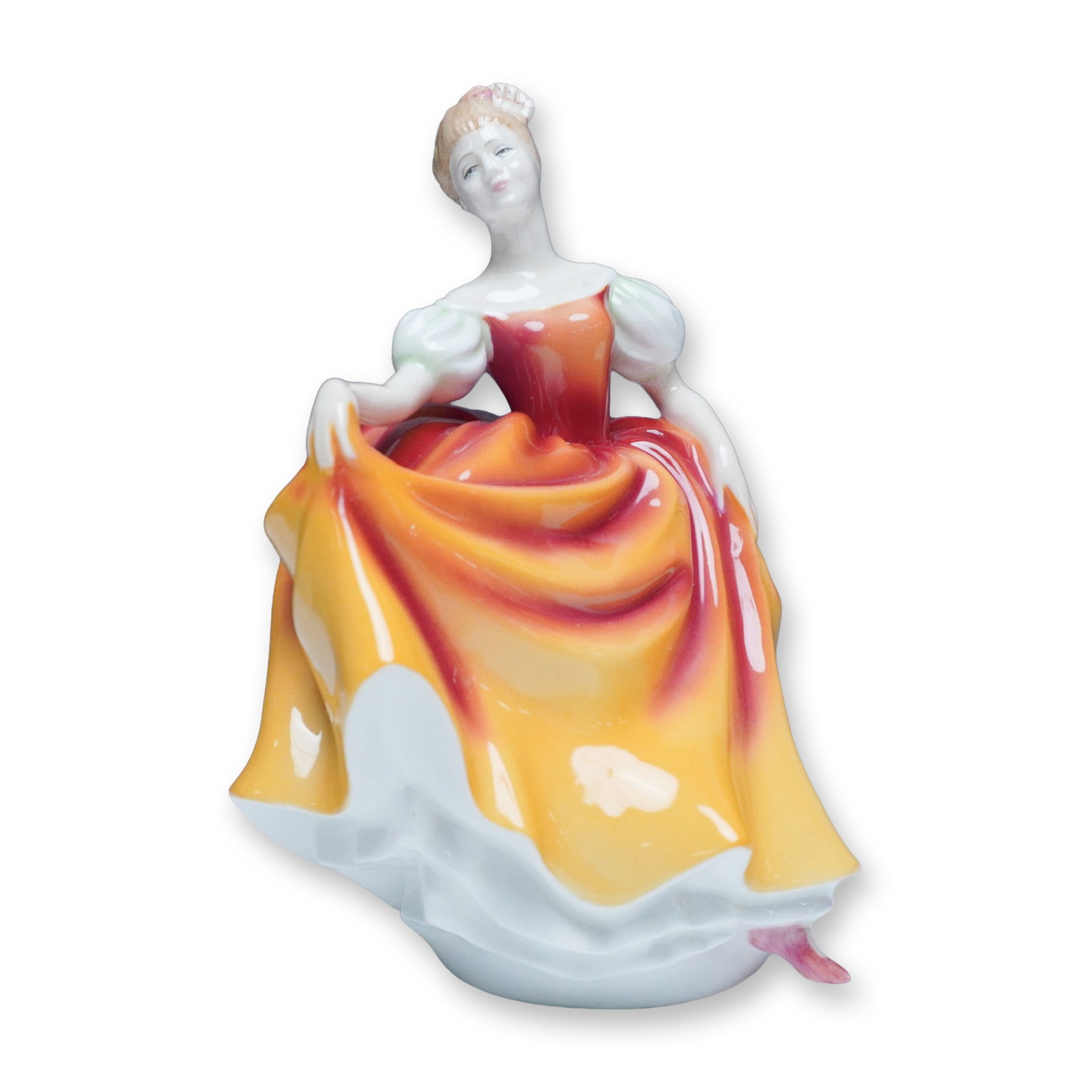 Royal Doulton Autumn Attraction HN 3612 Figurine: A Royal Doulton Autumn Attraction HN 3612 bone china figurine, modeled by renowned artist Peggy Davies. This exquisite figurine is part of The Four Seasons collection and was produced exclusively for 
